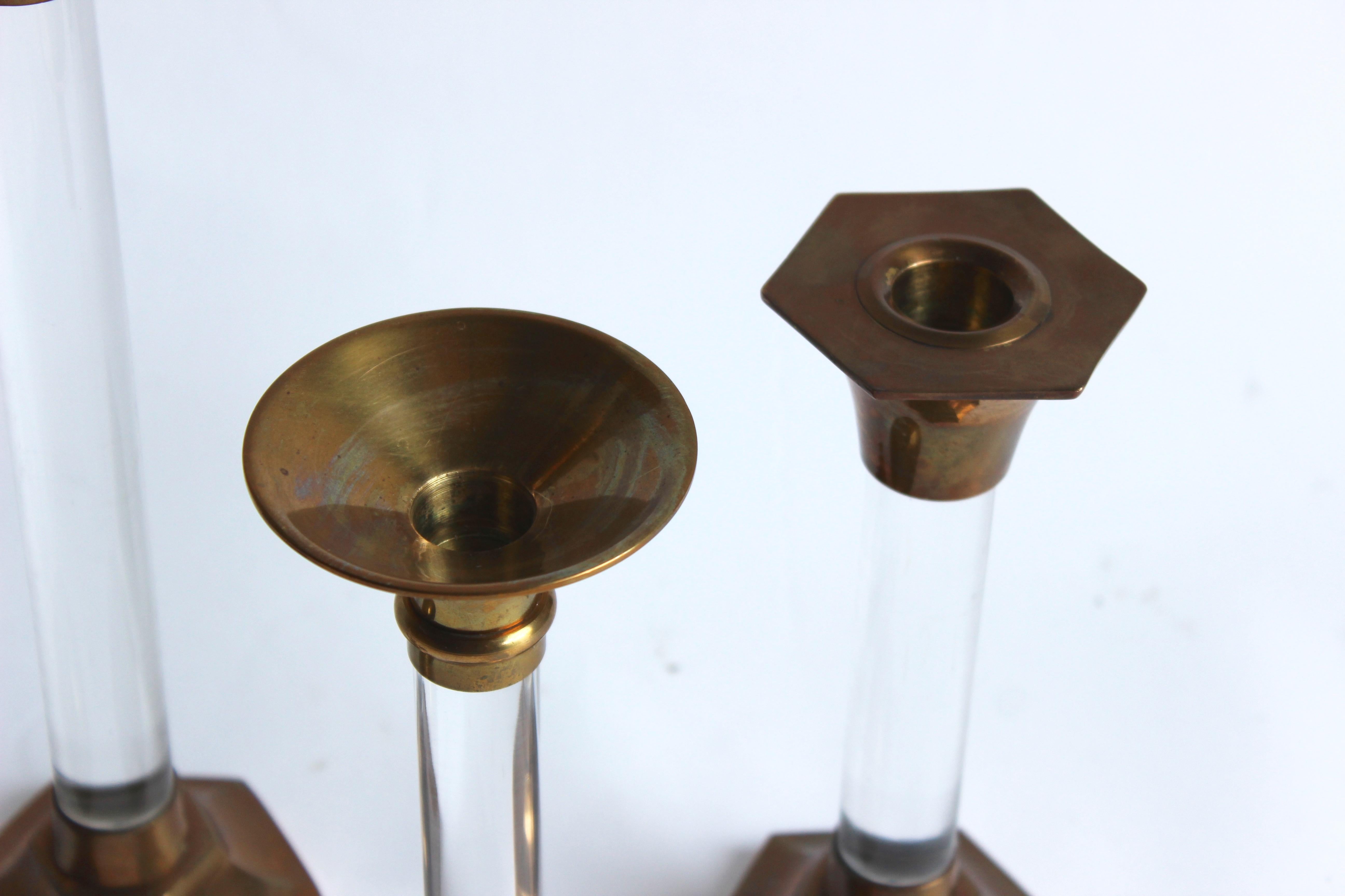 Set of Five Lucite and Brass Candlesticks 1