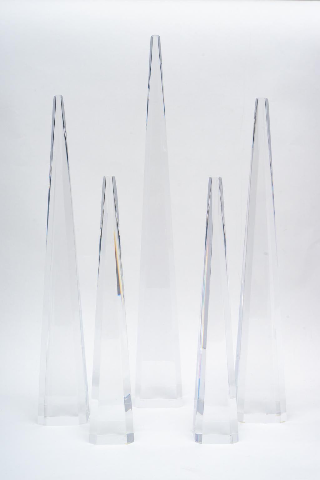 This stylish five piece set of 1970s Lucite obelisk will make a definite statement with their clean lines and Classic form. 

Various dimensions: 19.50