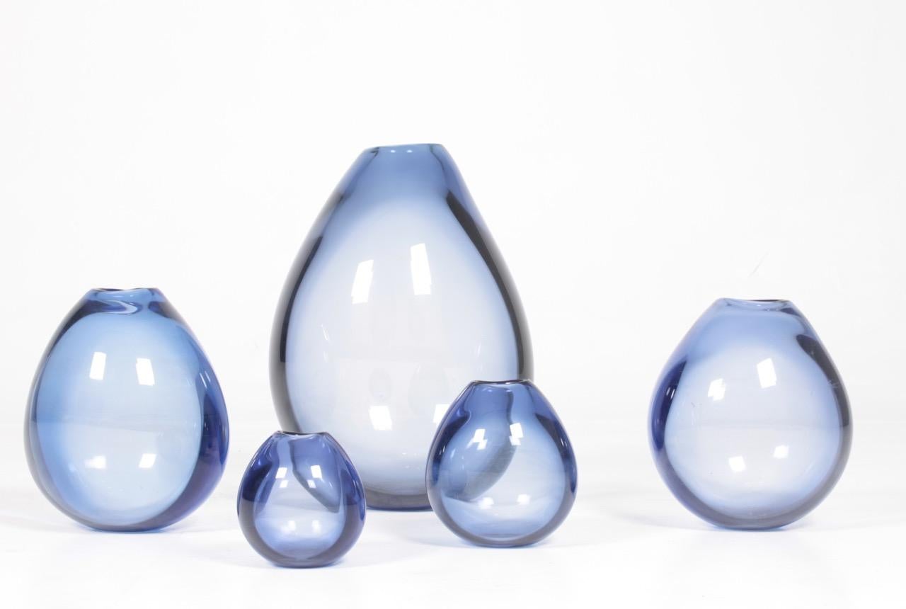 Rare collection of five vases in glass, designed by Per Lütken for Holmegaard. Largest size is 42 cm high and 30 cm wide. Made in Denmark, 1950s. Great original condition.