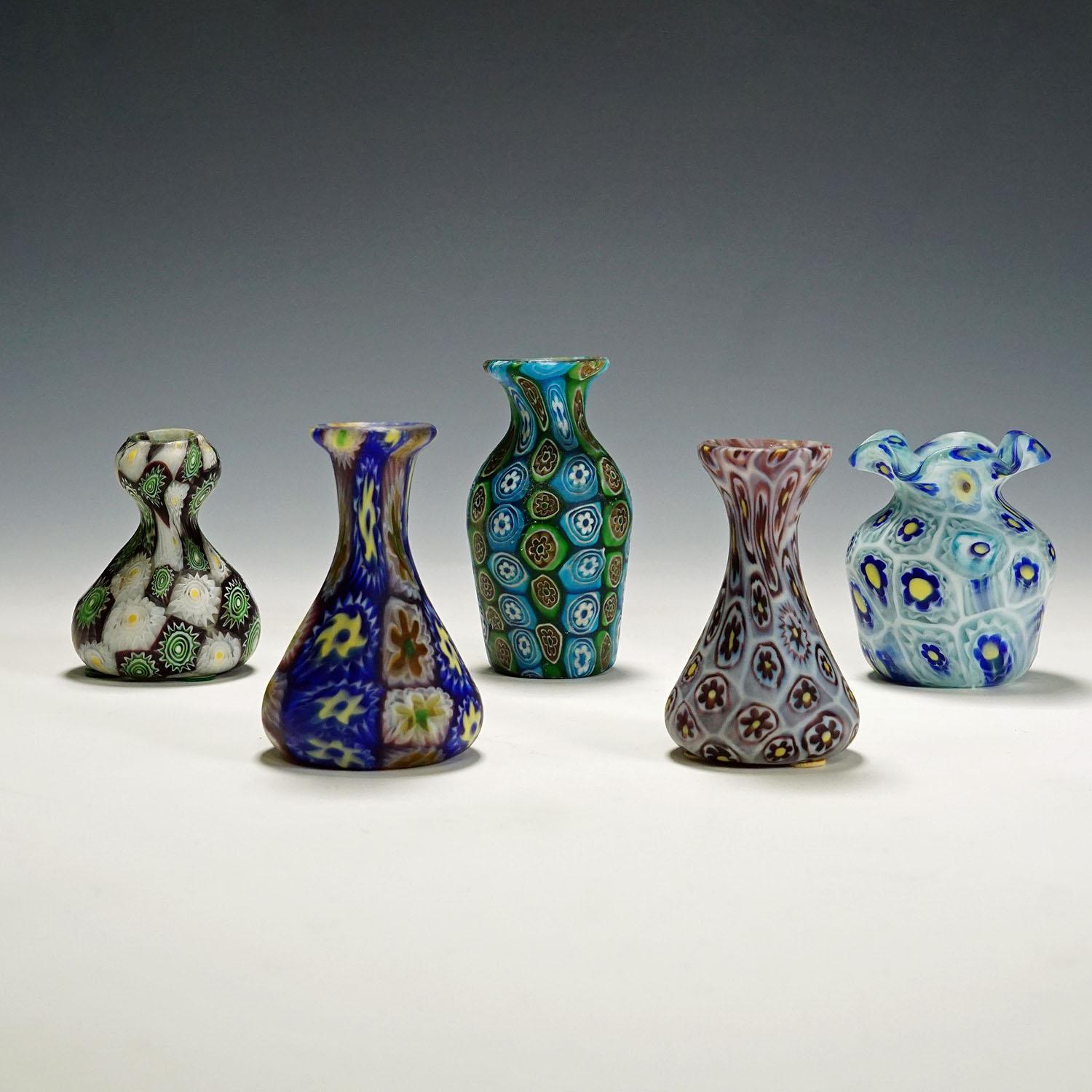 Set of five Millefiori vases by Fratelli Toso, Murano circa 1910.

A set of five millefiore murrine glass vases, manufactured by Vetreria Fratelli Toso around 1910-20. All vases are executed with polychrome multicoloured murrines and have an acid