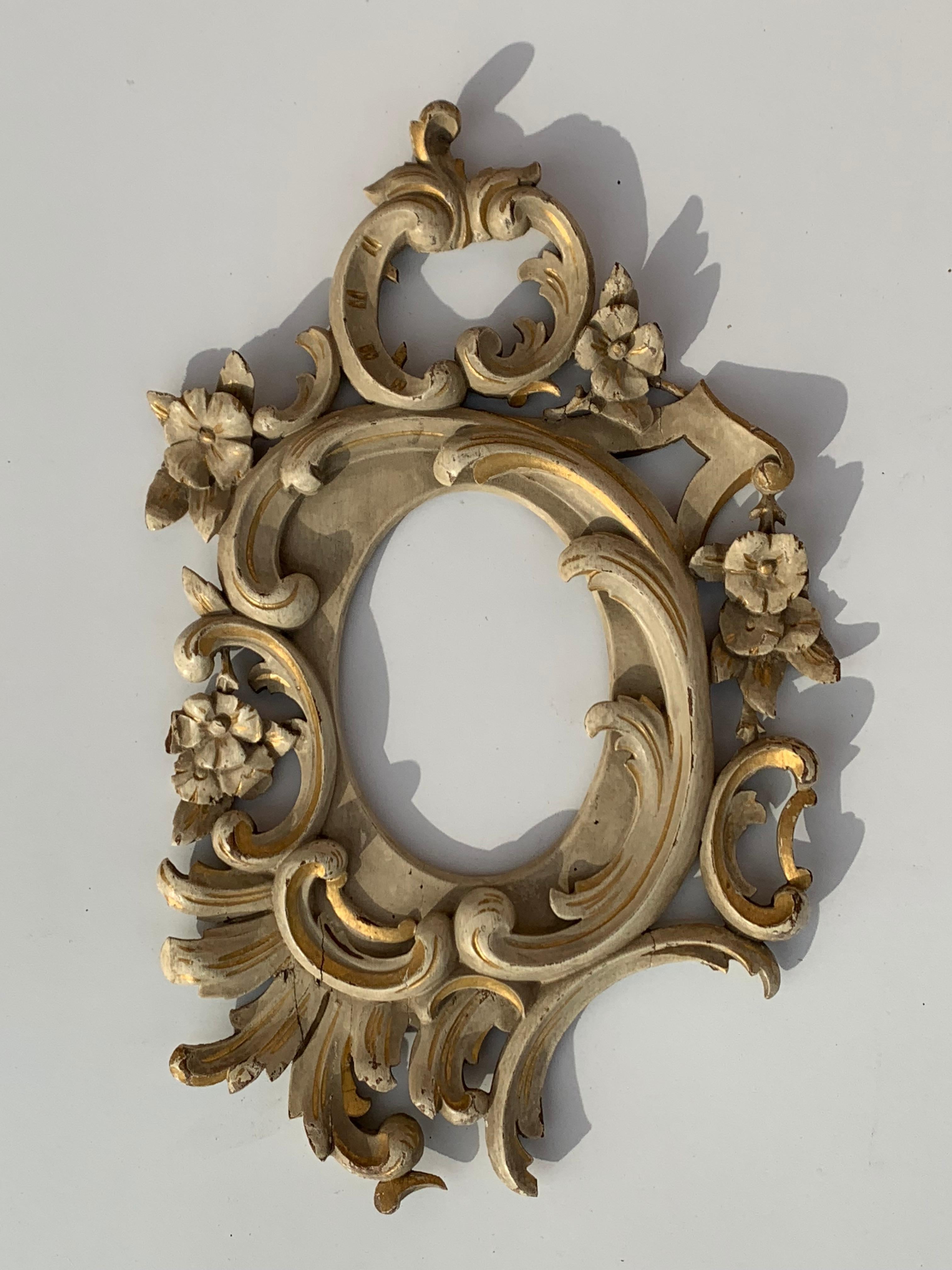Set of five miniature Rococo style hand carved mirror / photo frames.
Measures: Small frames measure 14