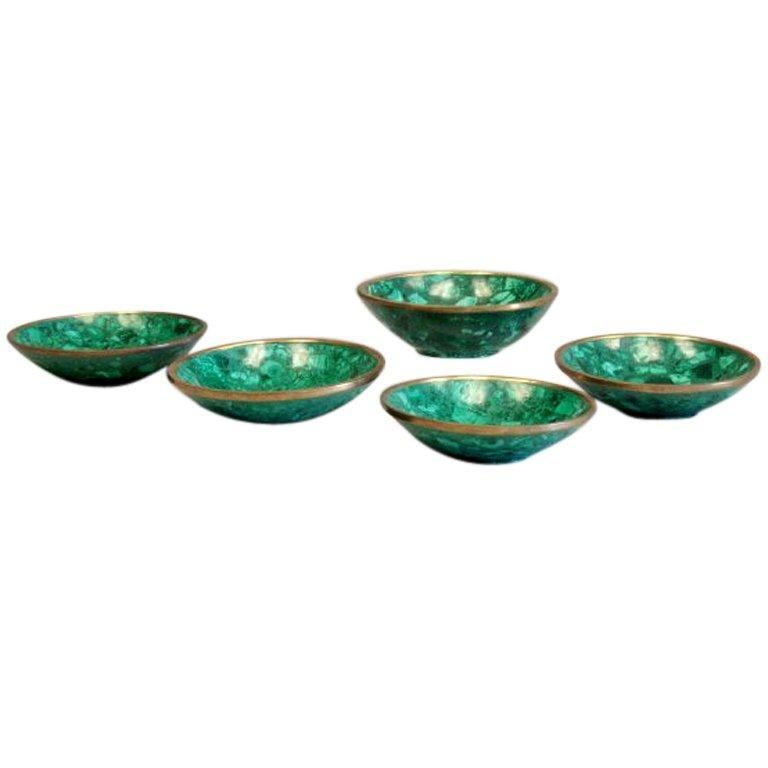 Set of five natural malachite and bronze bowls