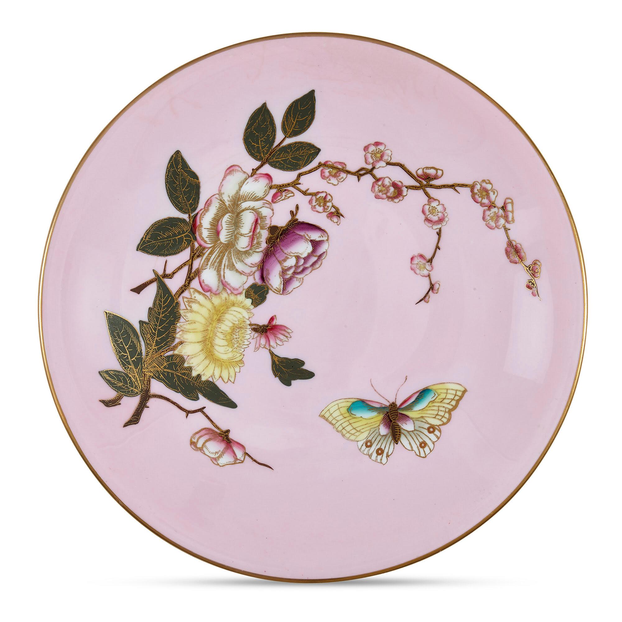 Set of five pink Royal Worcester plates with Japonisme decoration
English, early 20th century
Measures: Height 3cm, diameter 23cm

This superb set of Worcester porcelain plates features the highly unusual juxtaposition of a vibrant pink ground
