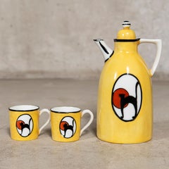 Juego de cinco tazas de porcelana, una tetera y una bandeja de Bastard París, Francia