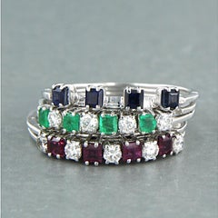 set of five rings 18k gold with sapphire, ruby, emerald and diamonds 0.50ct