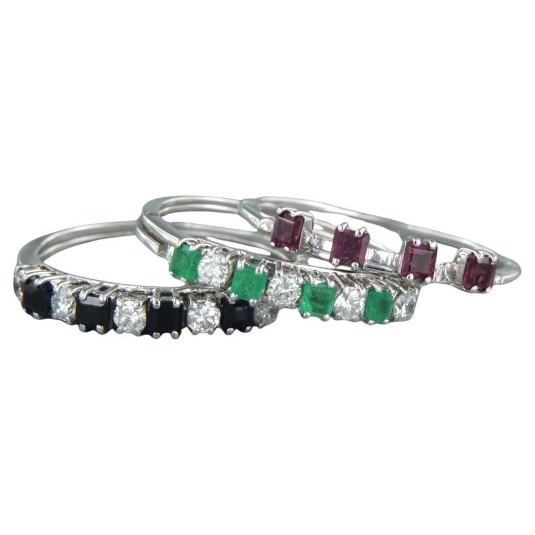 set of five rings 18k gold with sapphire, ruby, emerald and diamonds 0.50ct