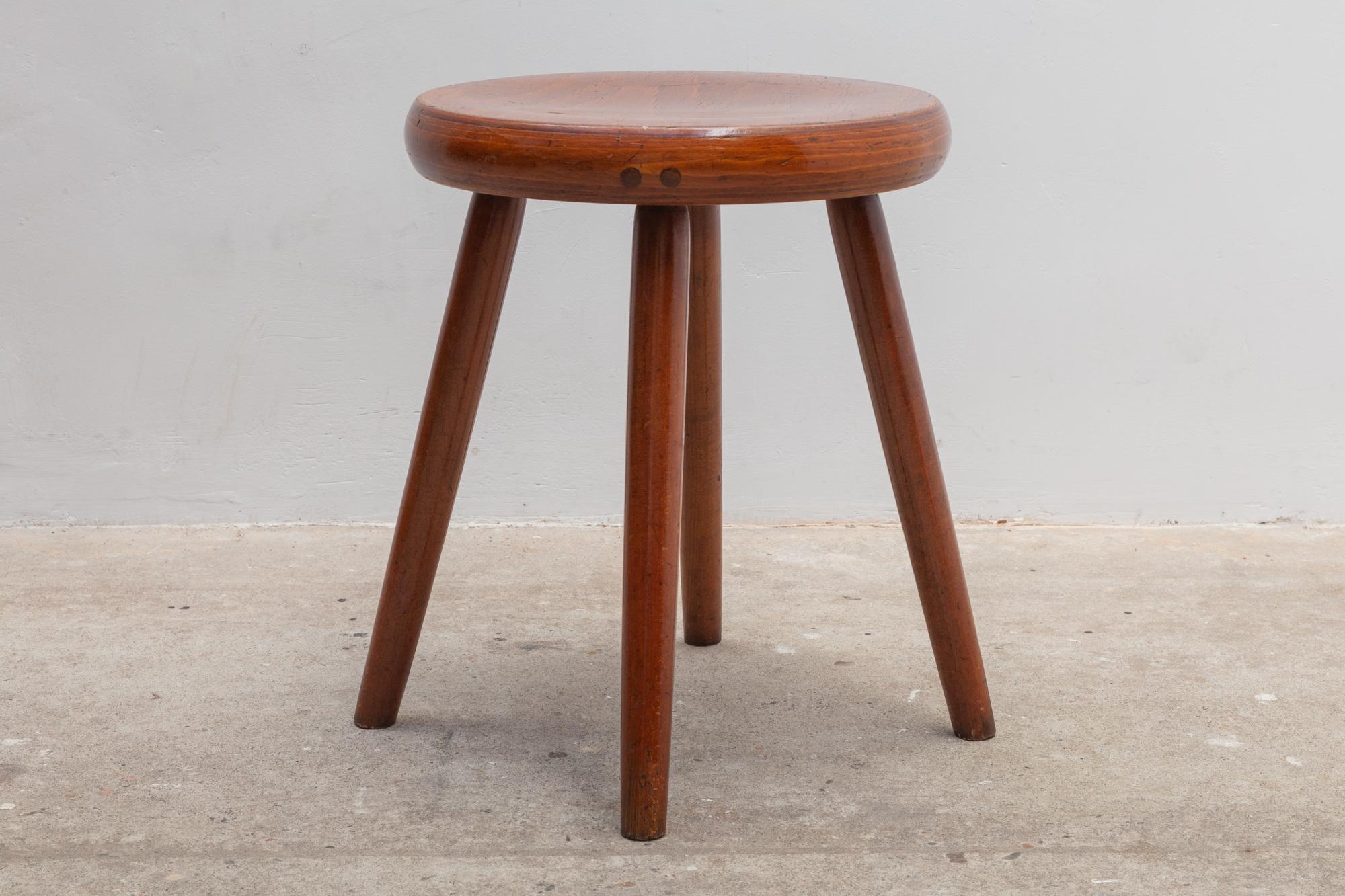 Nordic stools in rich brown wood with four pegged legs. Very nice patina and good condition. Seat height 45 cm.