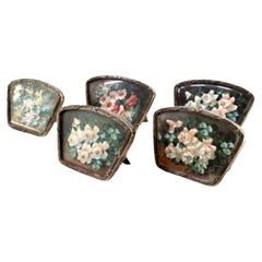 Set of five silver place markers with wraparound trim and support brackets