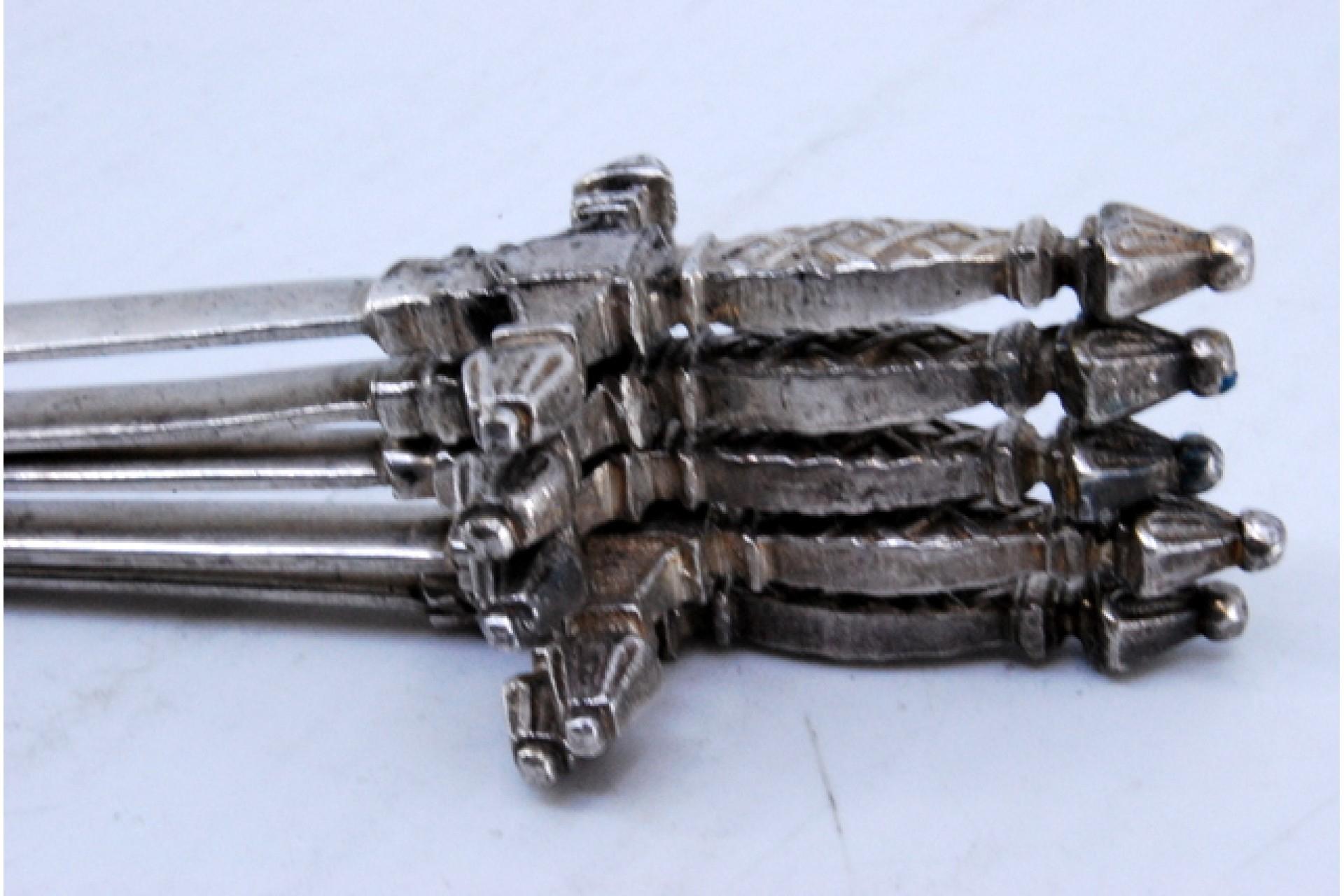 European Set of five silver swords with relief on the hilt For Sale