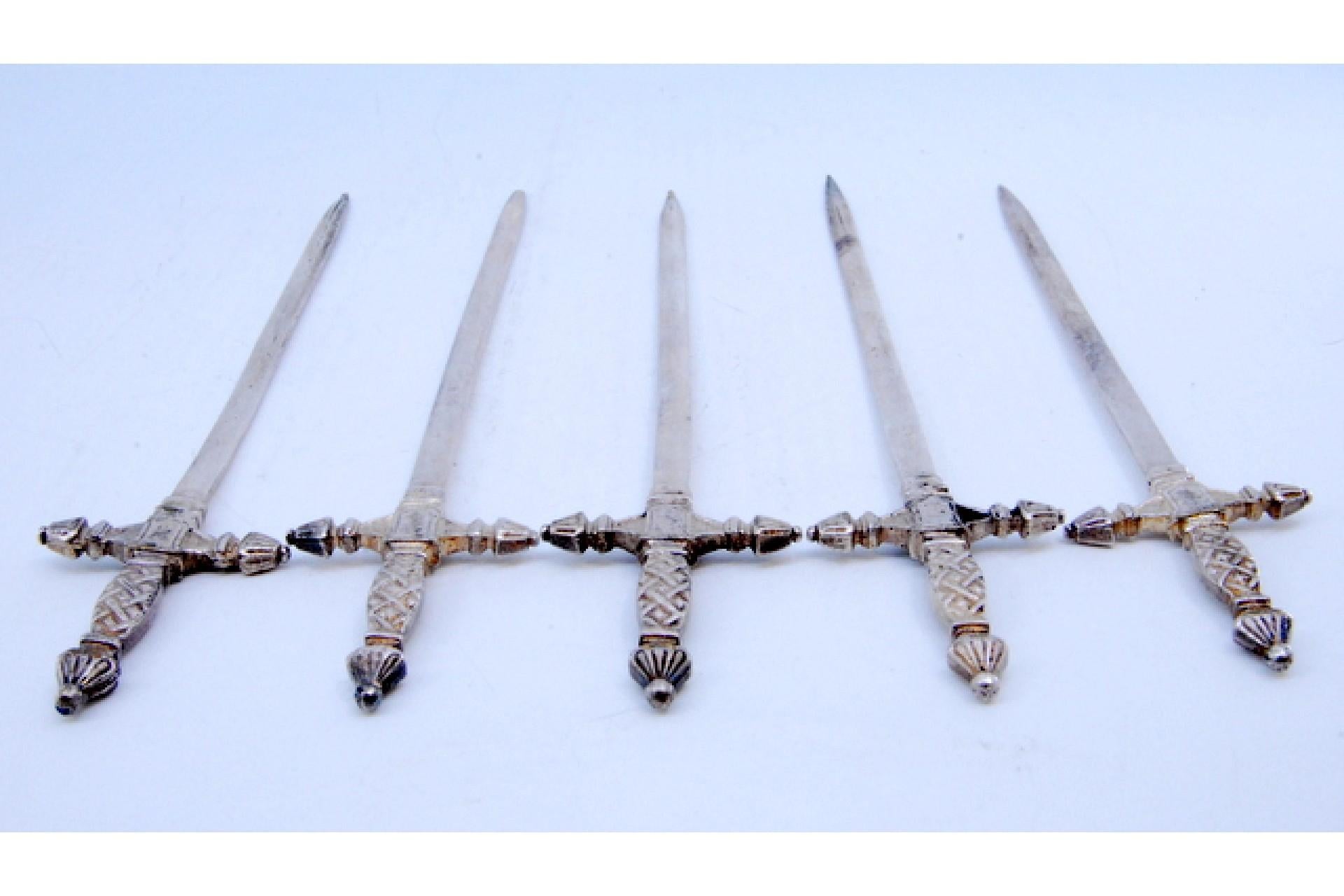 Set of five silver swords with relief on the hilt For Sale 2