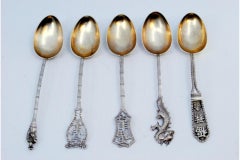 Set of five silver teaspoons with Chinese characters and motifs on the handles