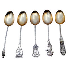 Set of five silver teaspoons with Chinese characters and motifs on the handles