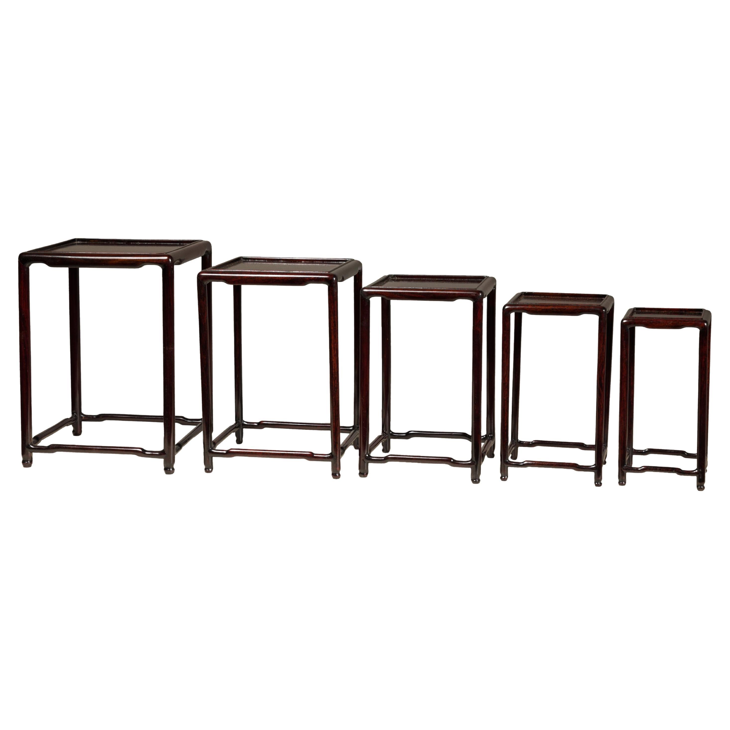 Set of Five Small Size Dark Rosewood Nesting Tables with Humpback Stretchers