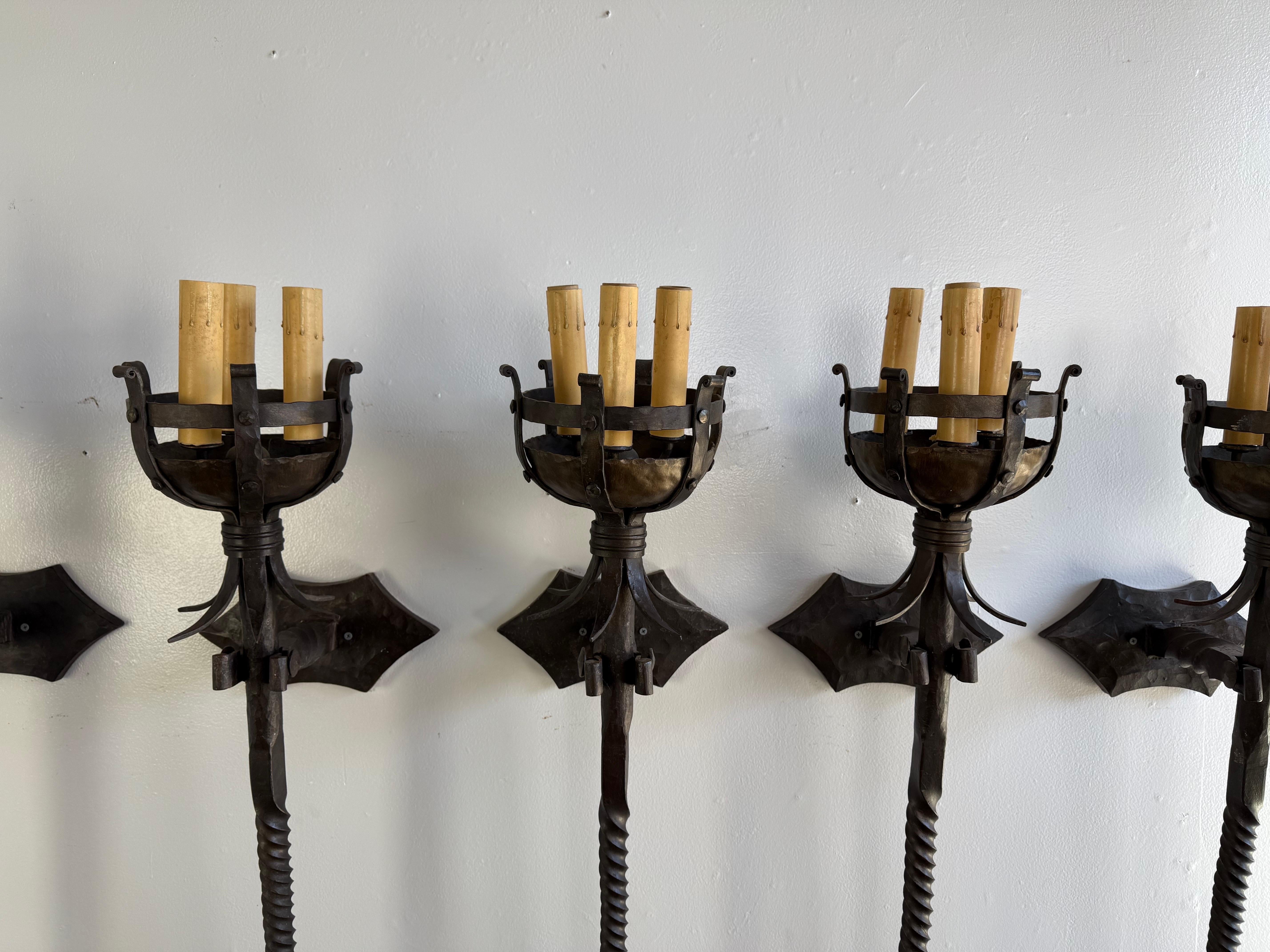Set of Five Spanish Wrought Iron Sconces In Distressed Condition In Los Angeles, CA