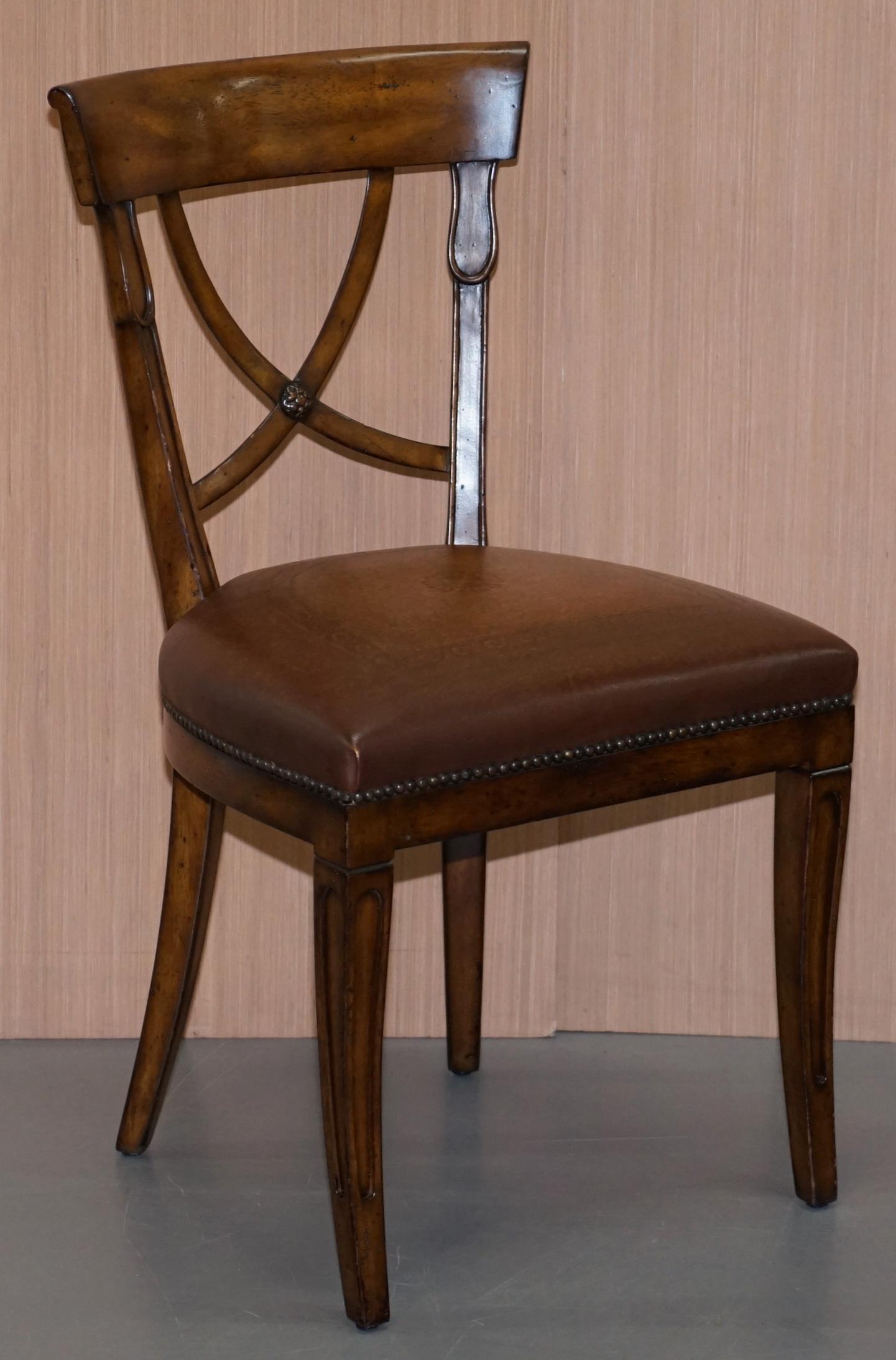 We are delighted to offer for sale this stunning set of five RRP £5500 brown leather Regency style Theodore Alexander dining chairs

A very good looking and well made set, they have the Theodore Alexander custom embossed leather to the seat top.