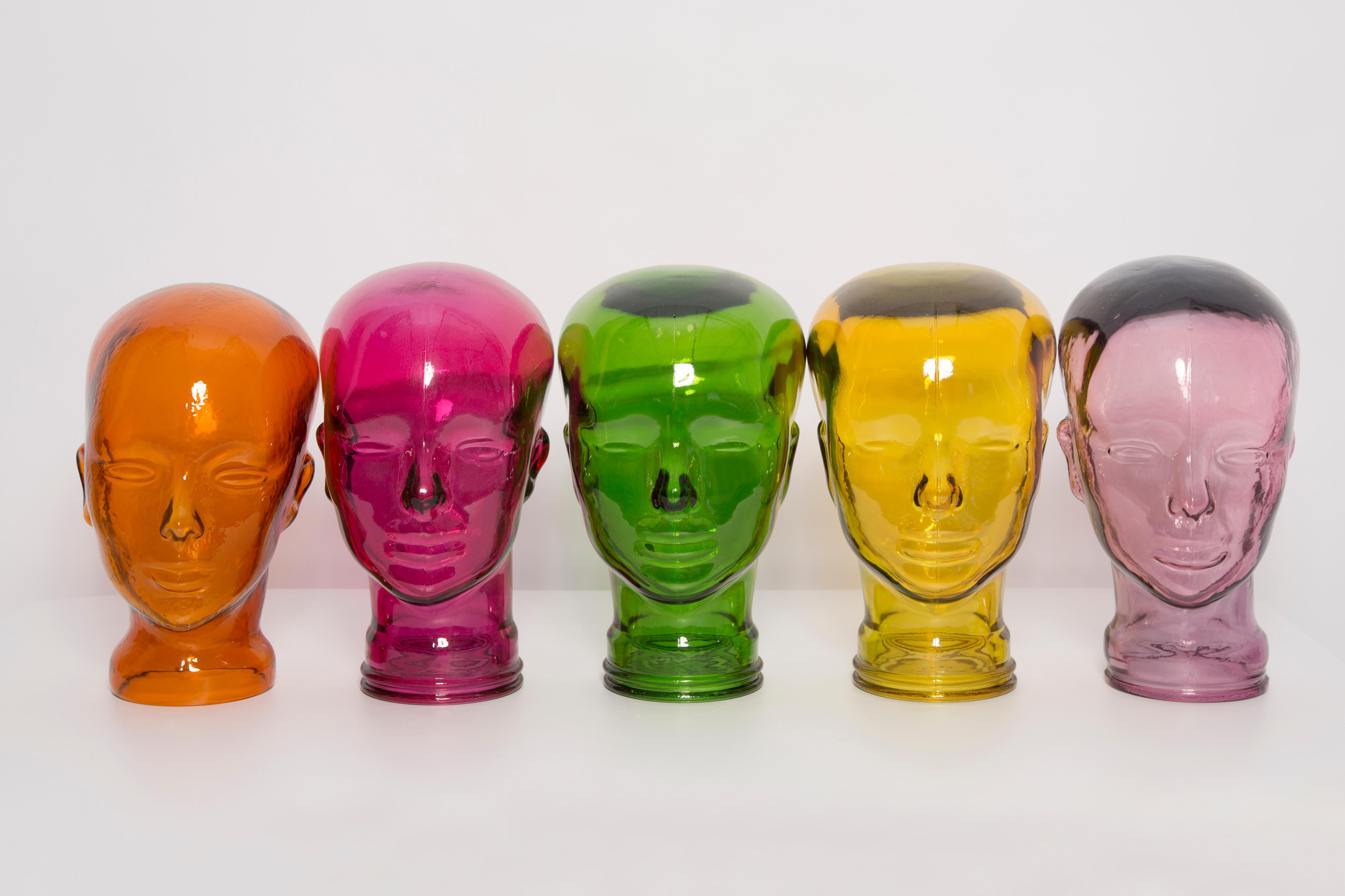 Set of 5 Life-size glass heads in a unique deep colors. Produced in a German steelworks in the 1970s. Perfect condition. A perfect addition to the interior, photo prop, display or headphone stand. Only one unique set.