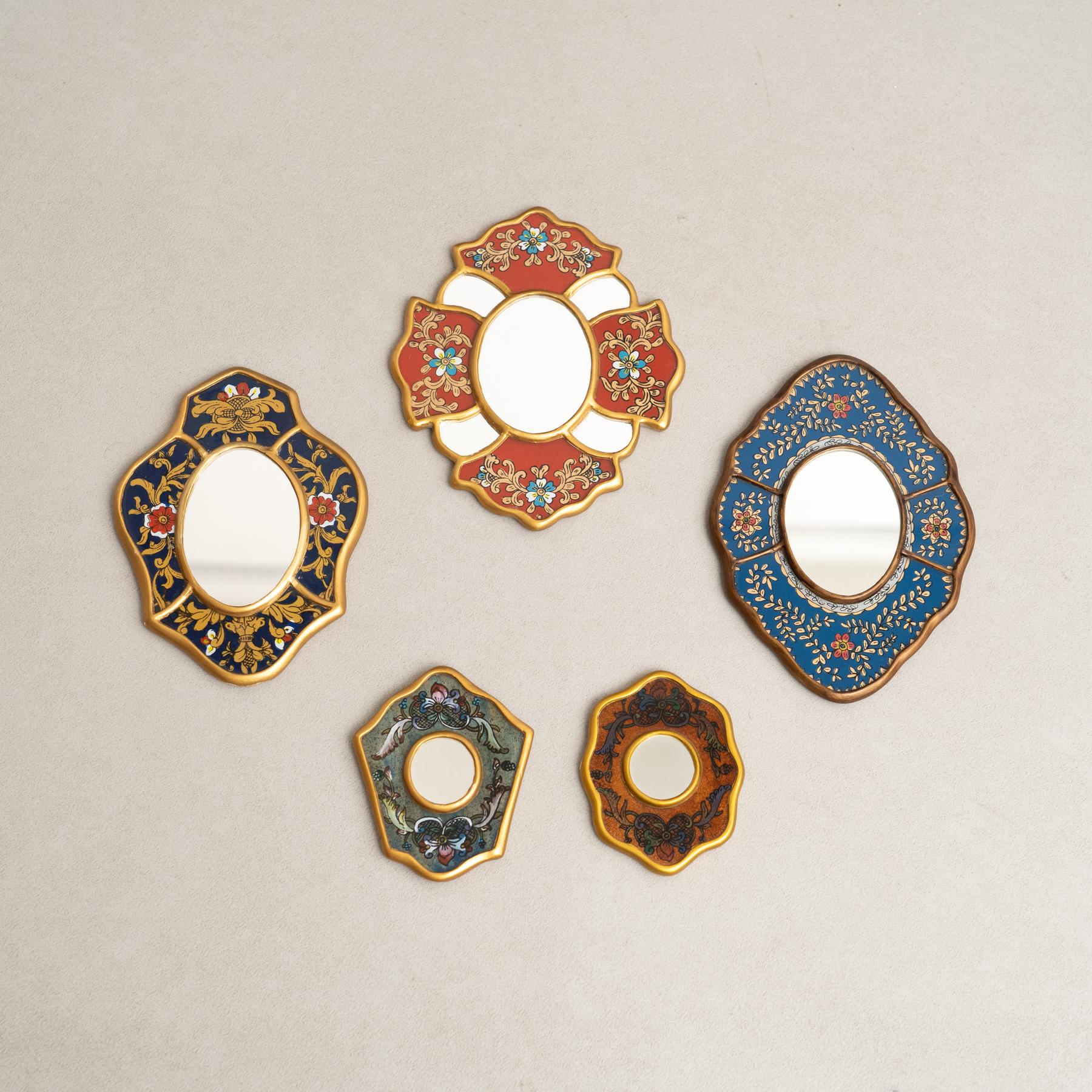 Set of Five Vintage Peruvian Mid-Century Hand-Painted Wooden Wall Mirrors.

Immerse yourself in the captivating charm of mid-century design with this remarkable collection of five hand-painted wooden wall mirrors, originating from 1960s Peru. Each