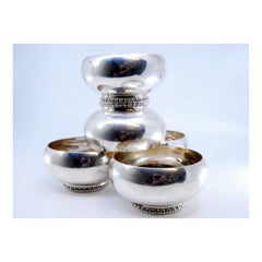 Set of five washbasins in smooth silver with beaded bases