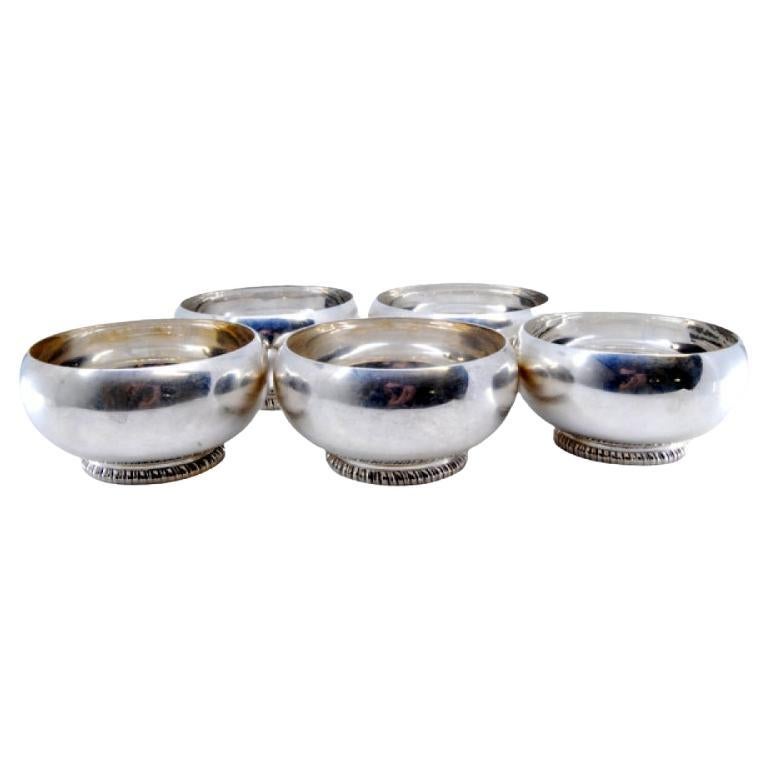 Set of five washbasins in smooth silver with beaded bases For Sale