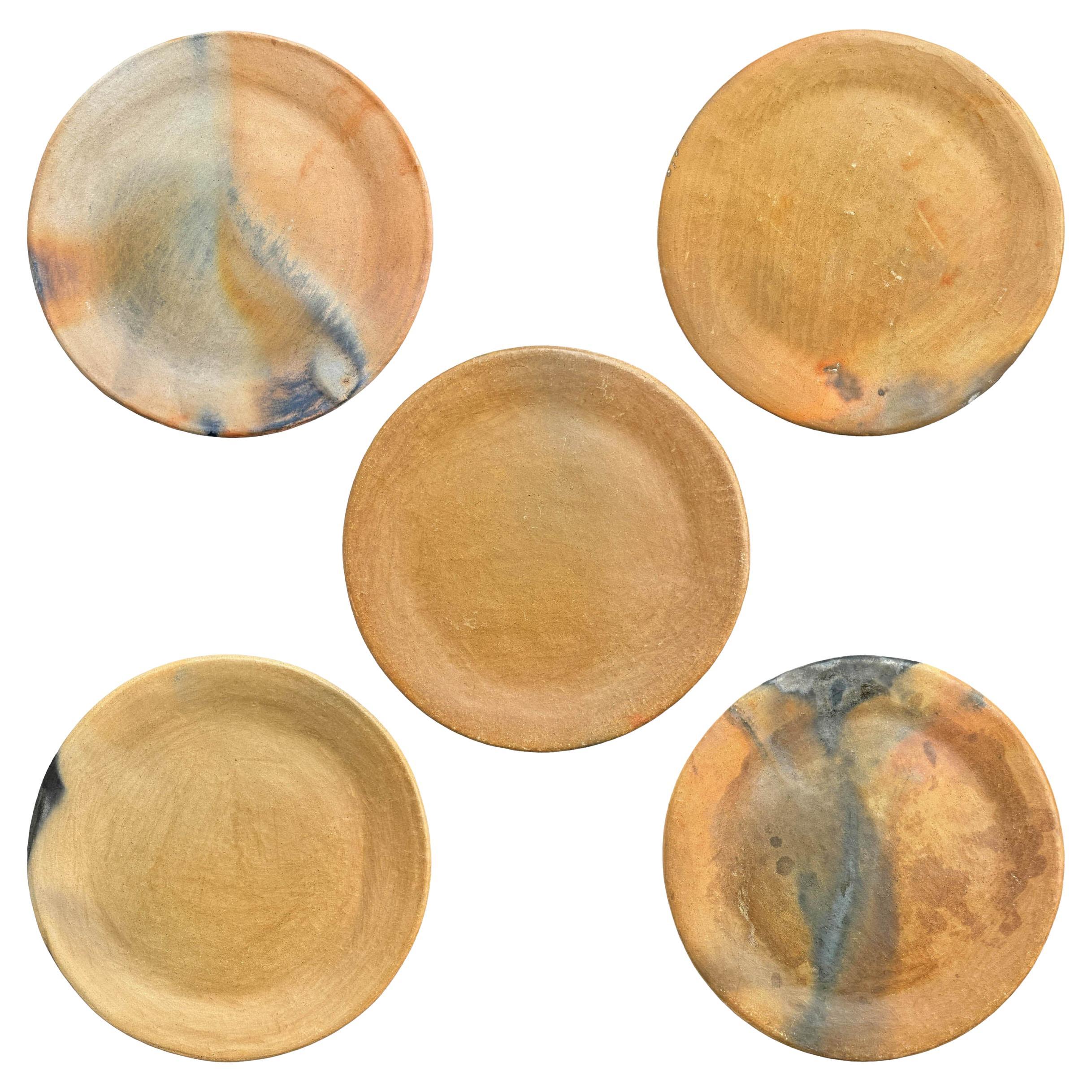 Set of Five Wood Fired Terra Cotta Plates For Sale