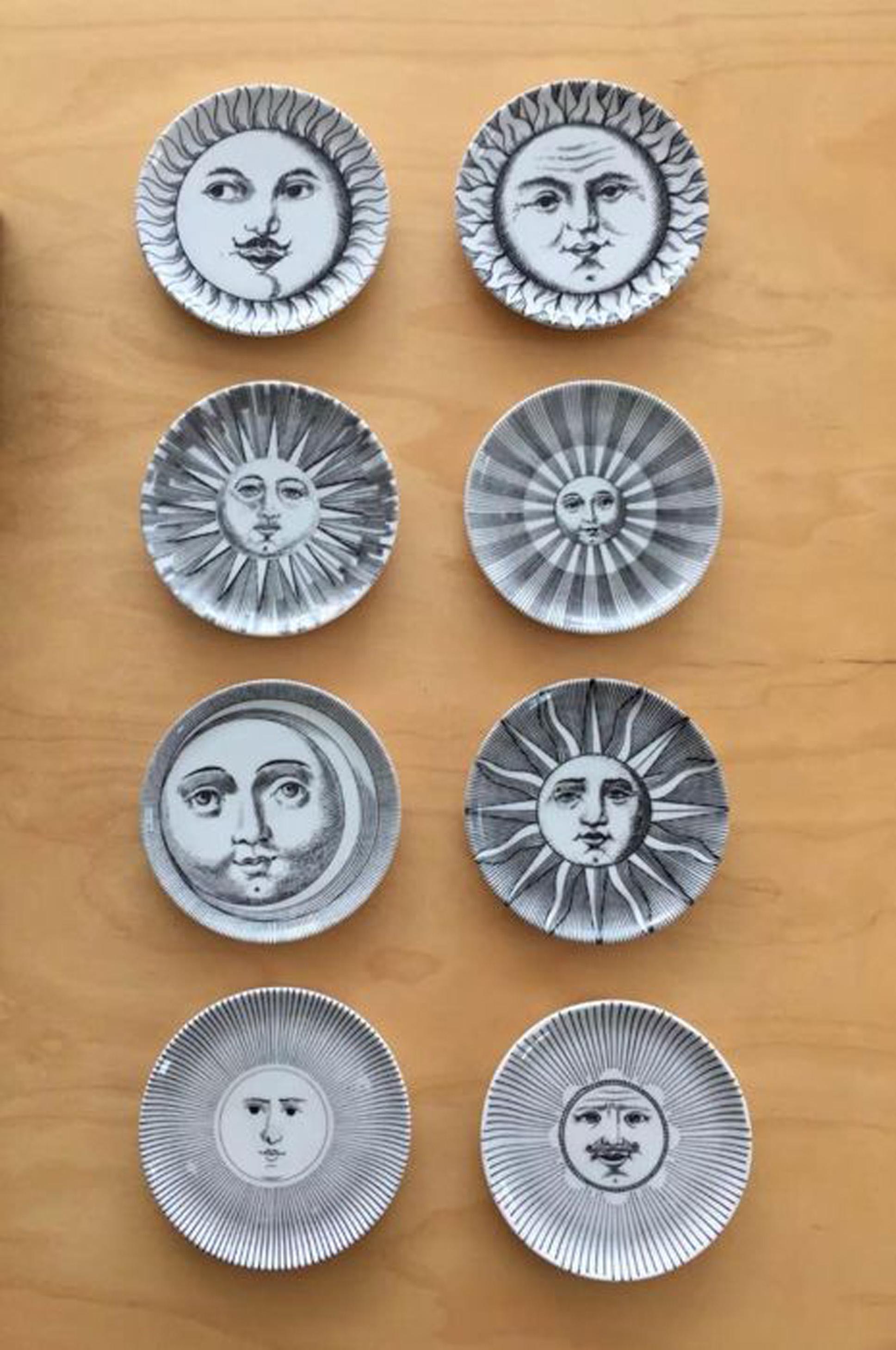 Set of Fornasetti Atalier Soli E Lune (Sun & Moon) boxed coaster set.

Each coaster decorated differently with Piero Fornasetti's classic images of a sun or moon in original black & white square box.

Dimensions: Coasters: 4 inch diameter.