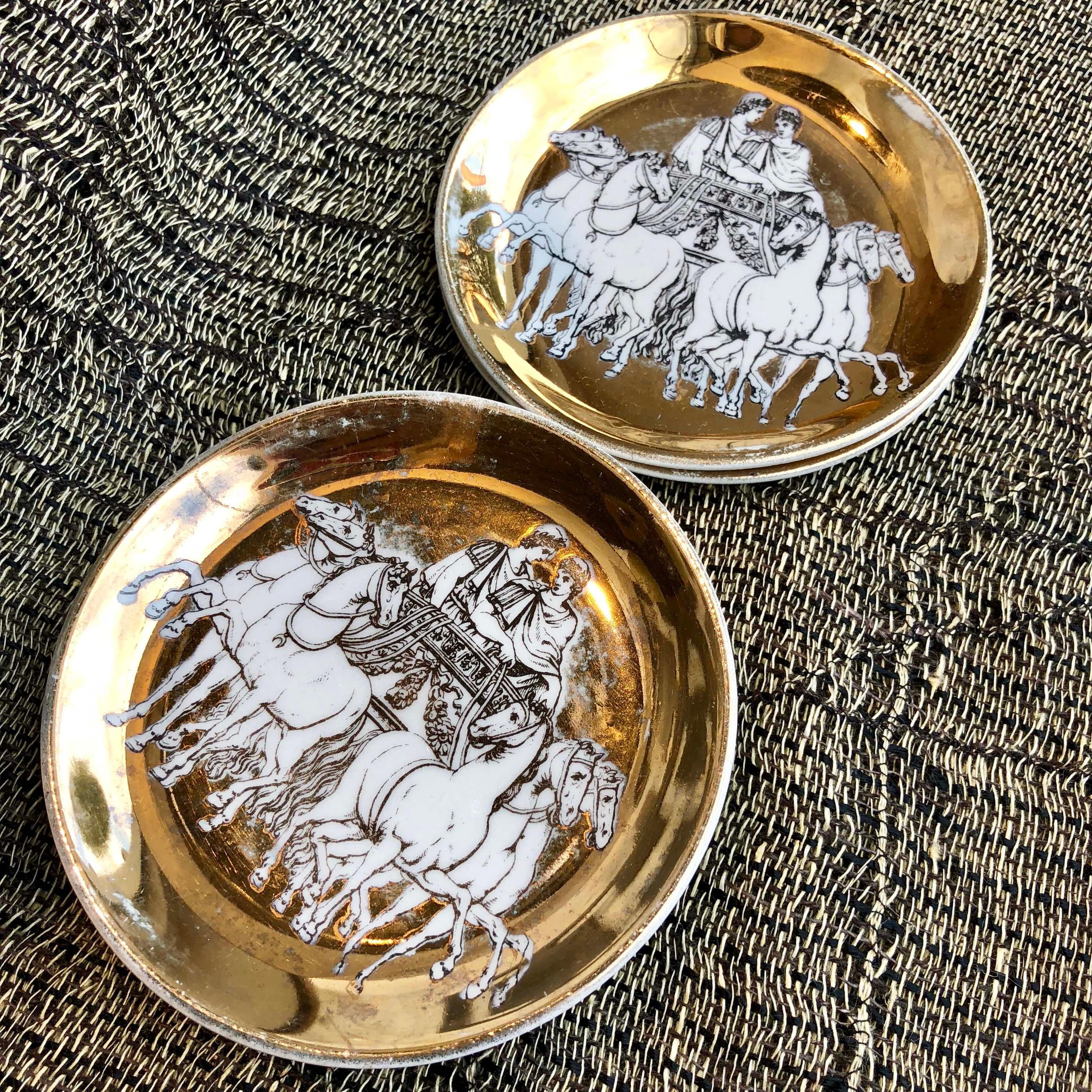 Highly collectable Fornasetti coasters, featuring gold leaf design with hand drawings of horses and chariot. Sold as a set of 6.

Measures: 10 Diameter cm each.

Good vintage condition considering the age.