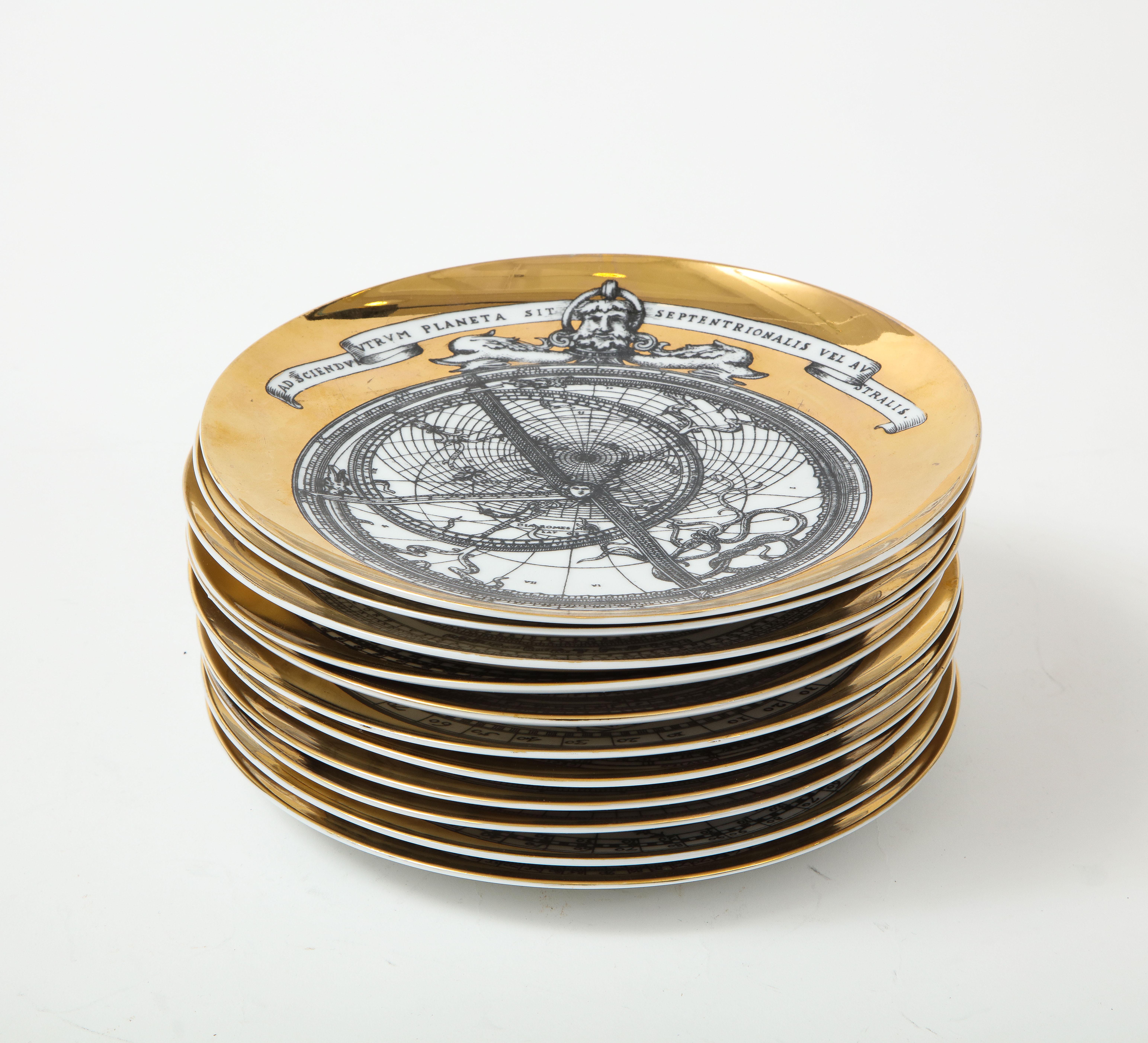 A set of eleven Piero Fornasetti plates. The plates are part of the Astrolabio series and each plate is stamped with the Fornasetti series mark. Fornasetti was a well known to have a love of astronomy and created this iconic design based on