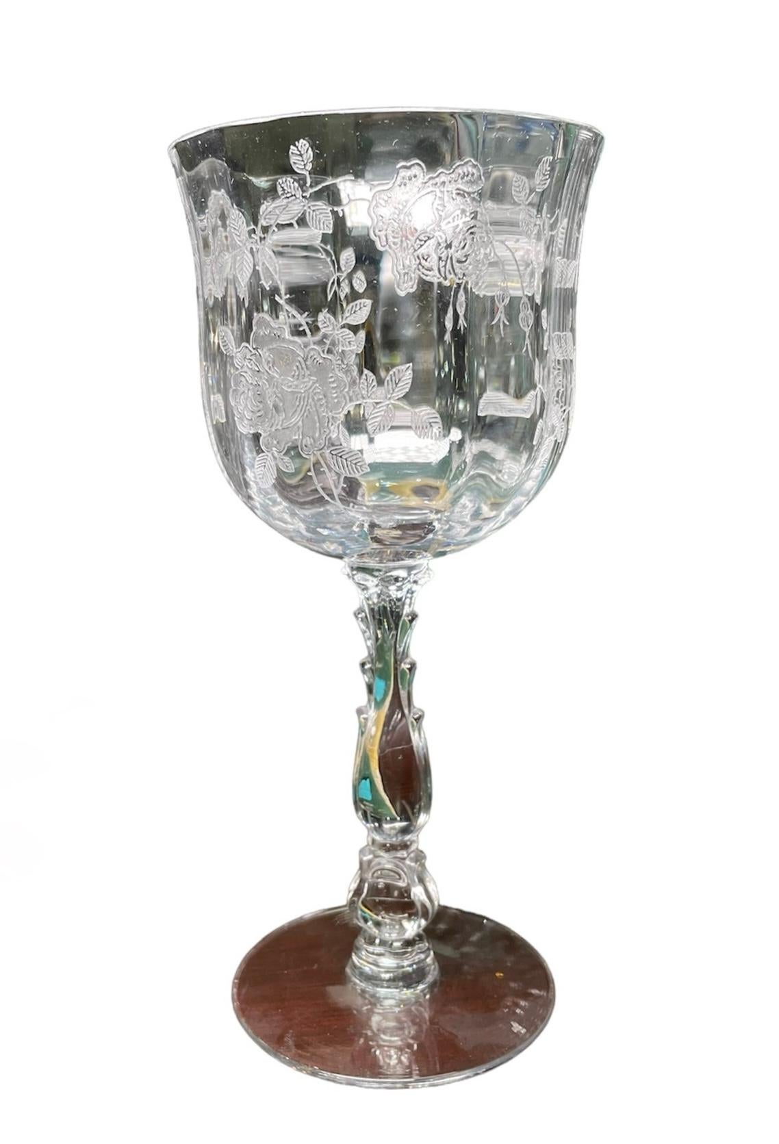 This is a Set of Fostoria Glass Willowmere Pattern. It depicts a set of 20 etched glasses adorned with bold roses on the vines. The set consists of WineGlasses- 2.18” diameter/ height -5.38” ( 4); Claret Wine Glasses - 2.25 “ diameter/ height-5.75 “