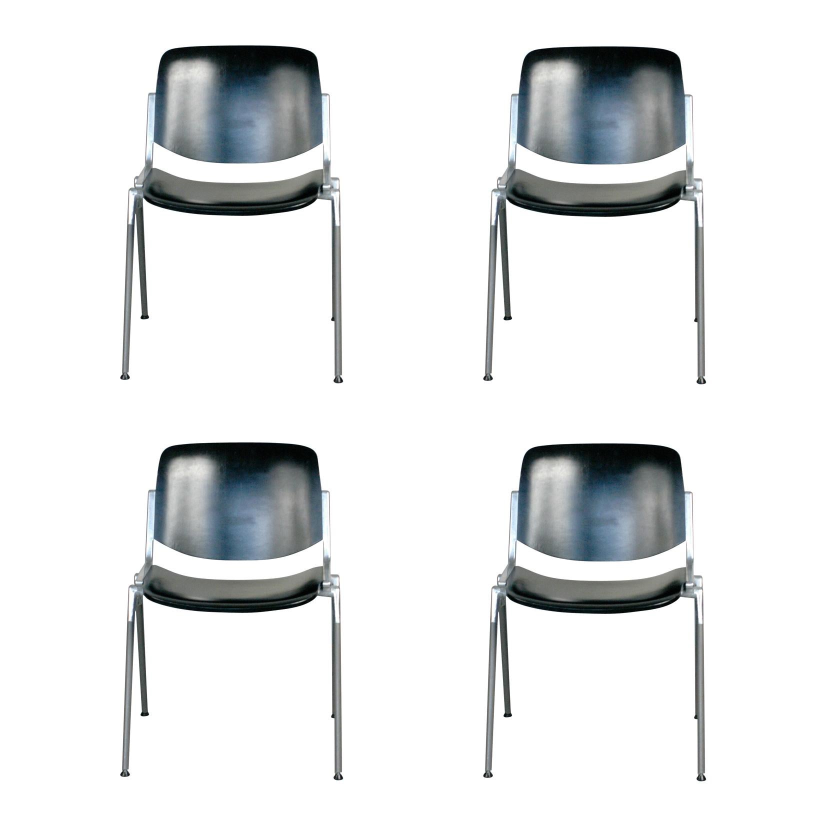 Set of Four Black Castelli Italy Dsc 106 Stacking Chairs by Giancarlo Piretti For Sale