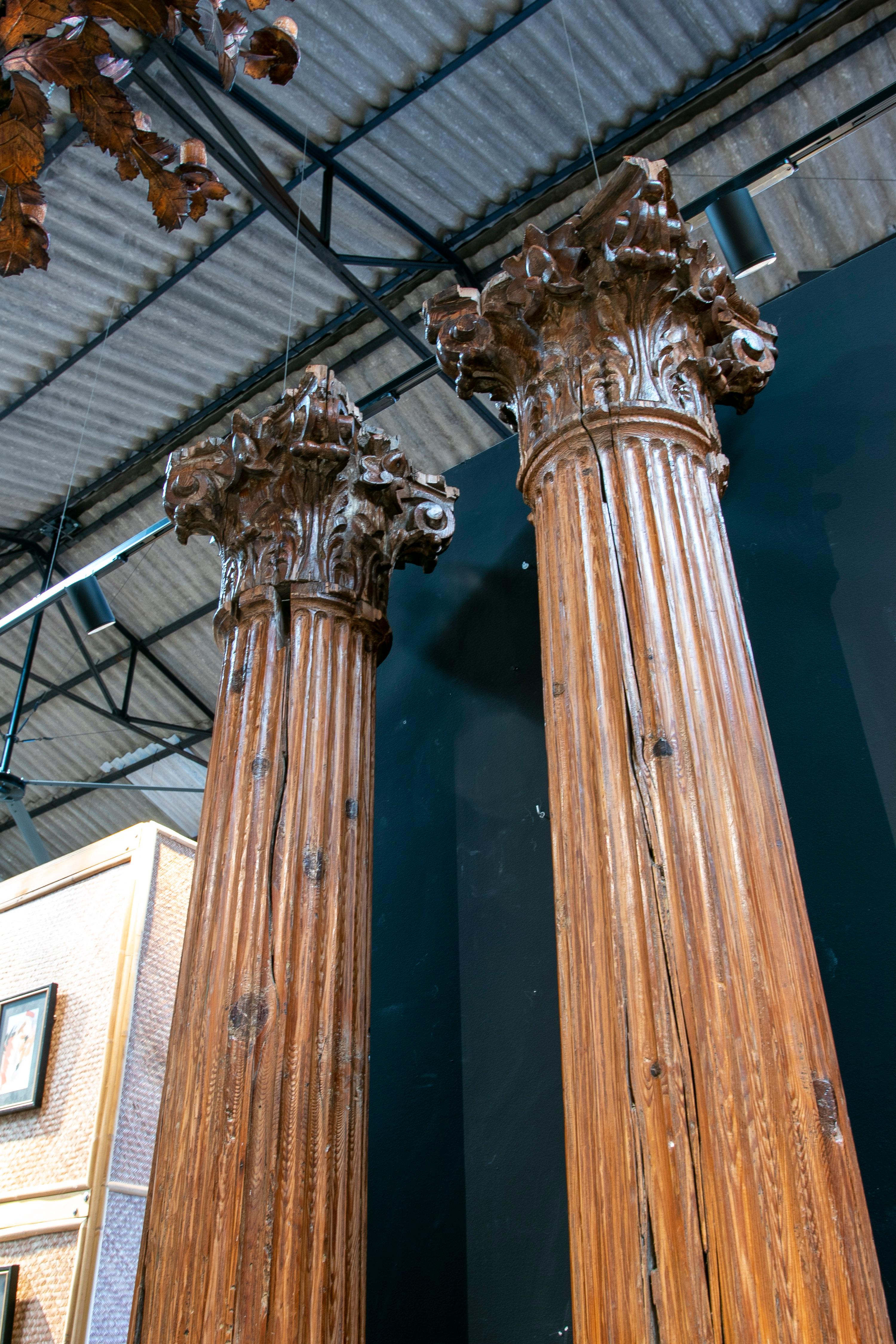 Hand-Carved Set of Four 17th Century Spanish Wooden Fluted Columns w/ Corinthian Capitals