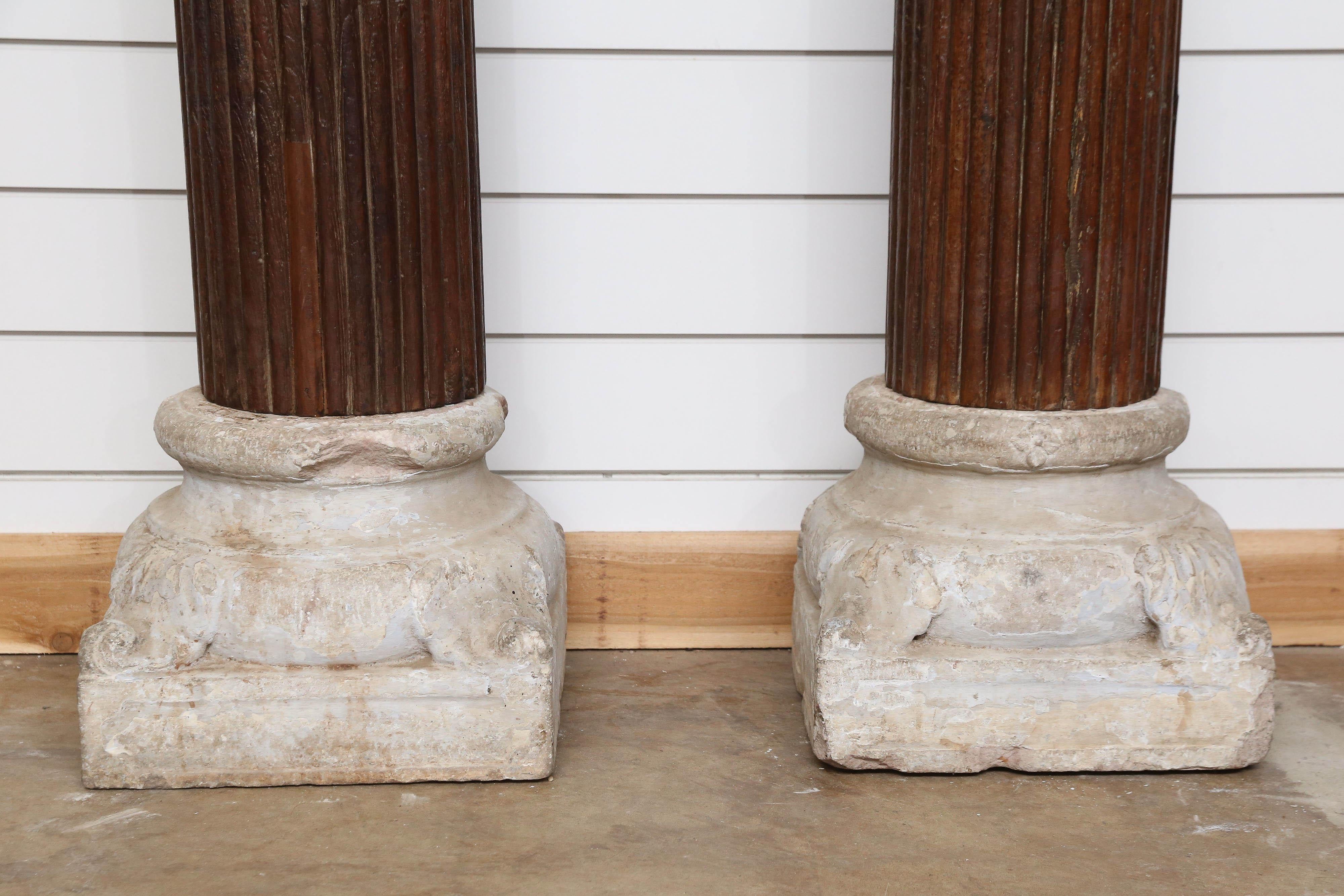 These columns once supported a huge three storied mansion. These were made of best quality teak wood. The wood is so hard and heavy it looks and feels like iron. It was a great engineering feat for to make the four perfect large round columns