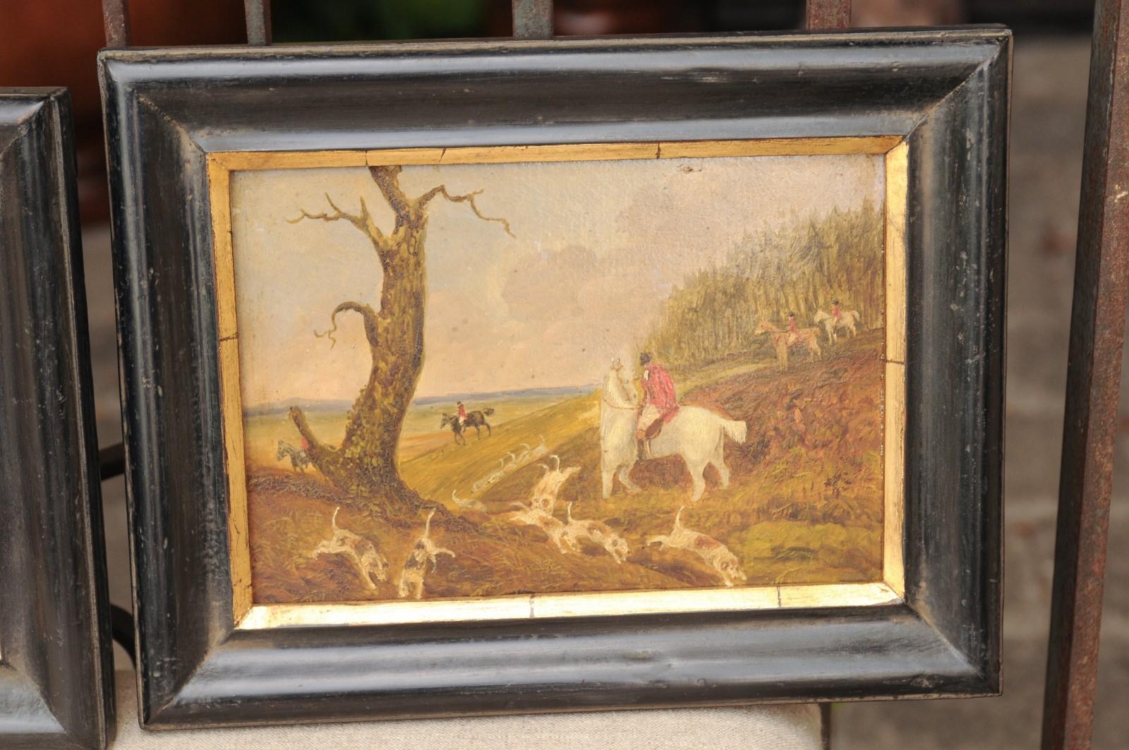 A set of four English framed oil on board paintings from the late 19th century, featuring hunting scenes. Born in England during the later years of the 19th century, each of this set of four oil on board paintings depicts a hunting scene. Featuring