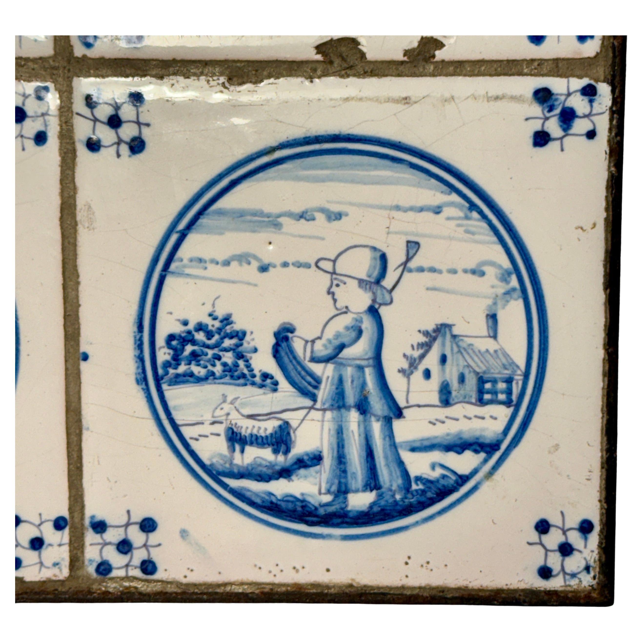 Olandese Set di quattro piastrelle Delft blu e bianche del XVIII secolo incorniciate in una cornice di ferro personalizzata in vendita