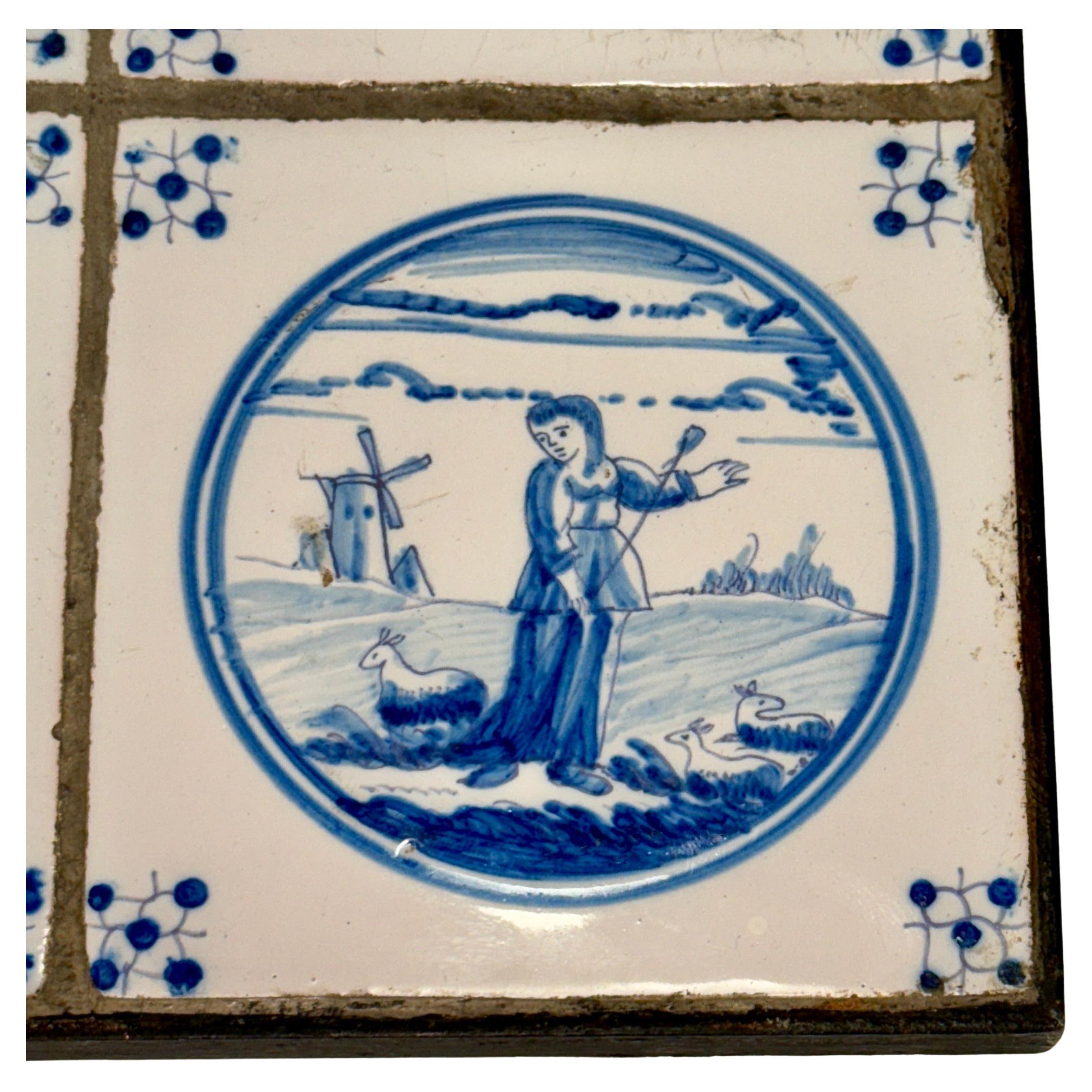 Fatto a mano Set di quattro piastrelle Delft blu e bianche del XVIII secolo incorniciate in una cornice di ferro personalizzata in vendita