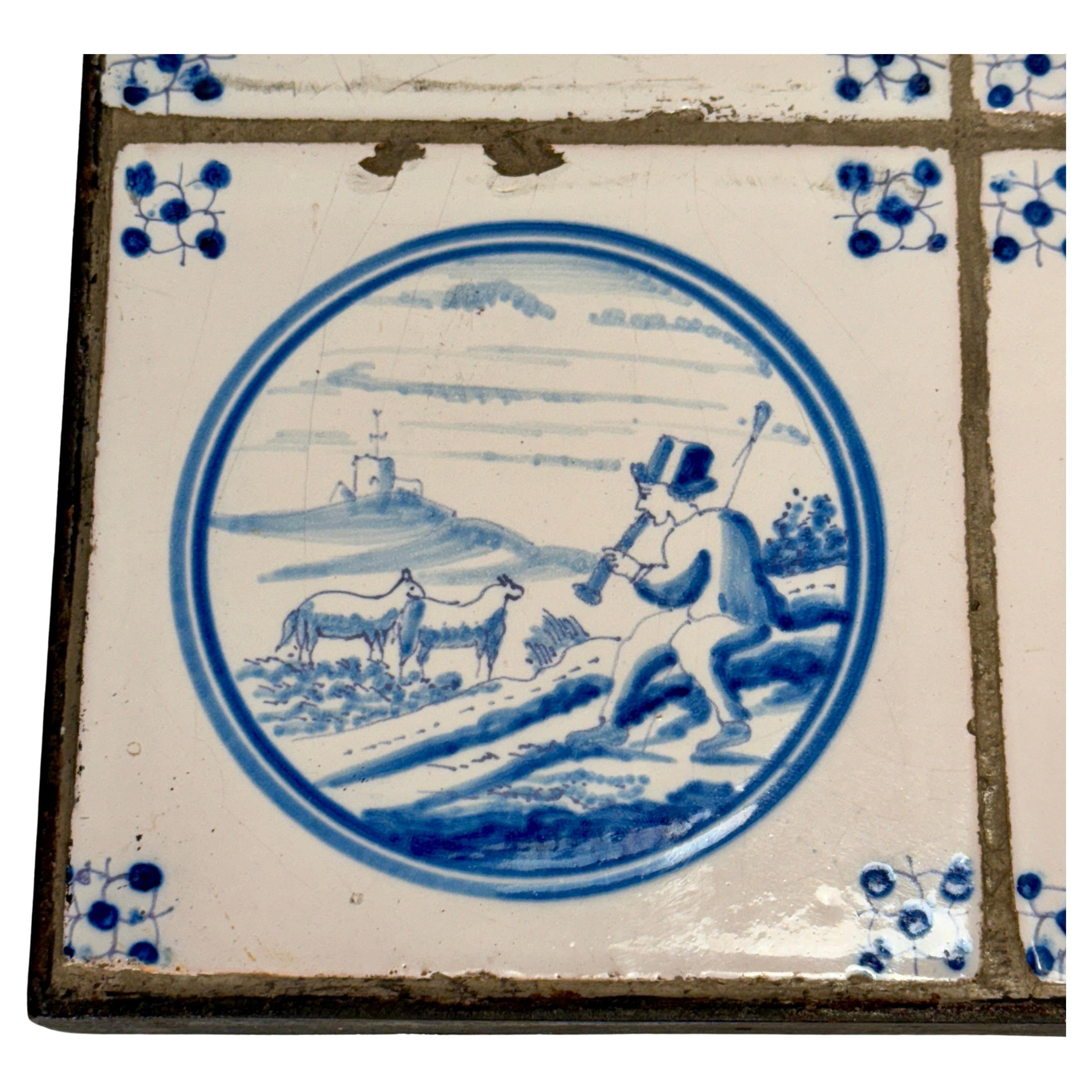 Faience Set of four 18th Century Blue and White Delft Tiles Framed in Custom Iron Frame  For Sale