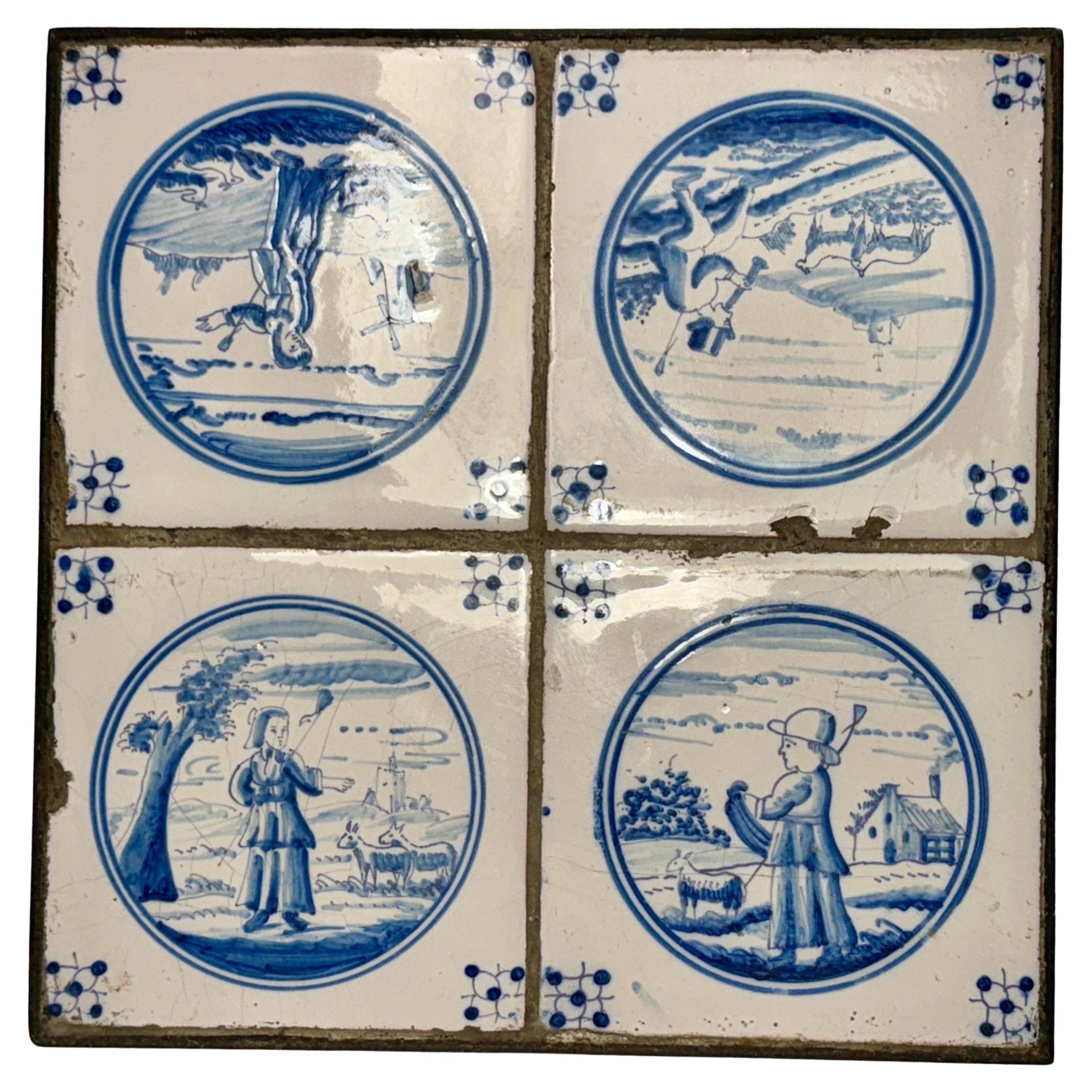 Satz von vier blauen und weißen Delft-Fliesen aus dem 18. Jahrhundert, gerahmt in einem individuellen Eisenrahmen  im Angebot