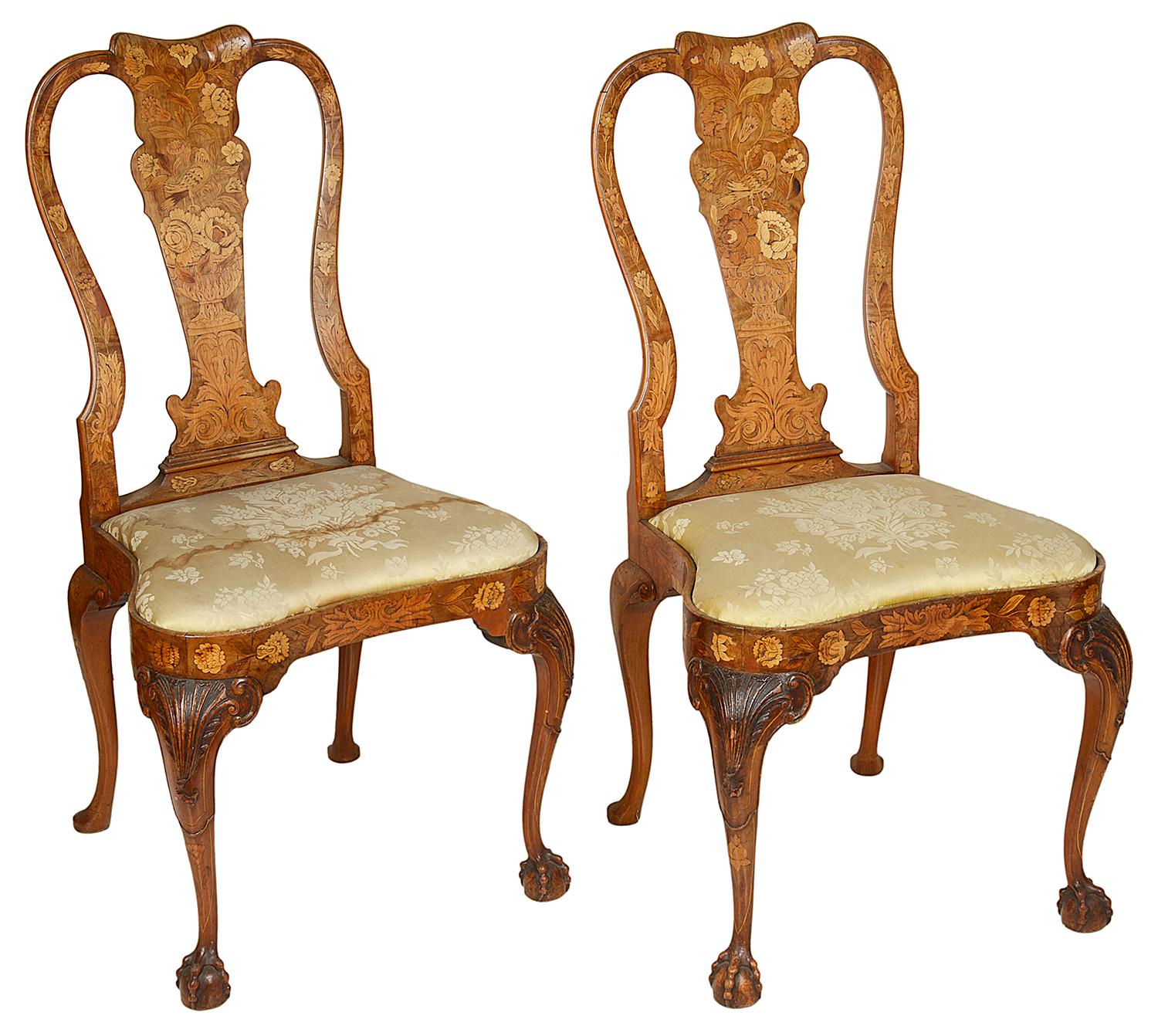 A fine quality set of four, 18th century Dutch marquetry side chairs. Each with wonderful inlaid decoration, depicting flowers, birds and leaves to the back rest, frieze and legs. Drop in upholstered seats and raised on beautifully carved cabriole