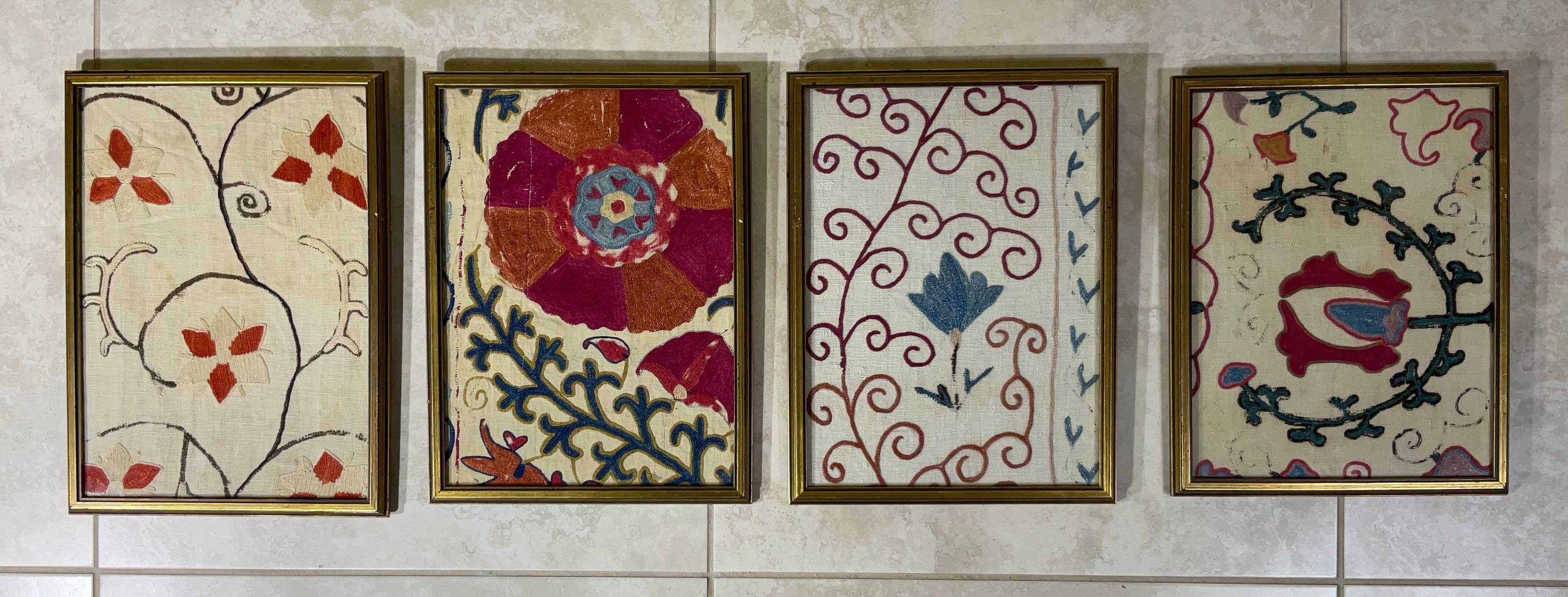Exceptional antique hand embroidery fragments of Suzani textile, professionally mounted on four solid  wood frame to make beautiful versatile objects of art for wall hanging.
Even though these hand made fragments are almost century old we can still