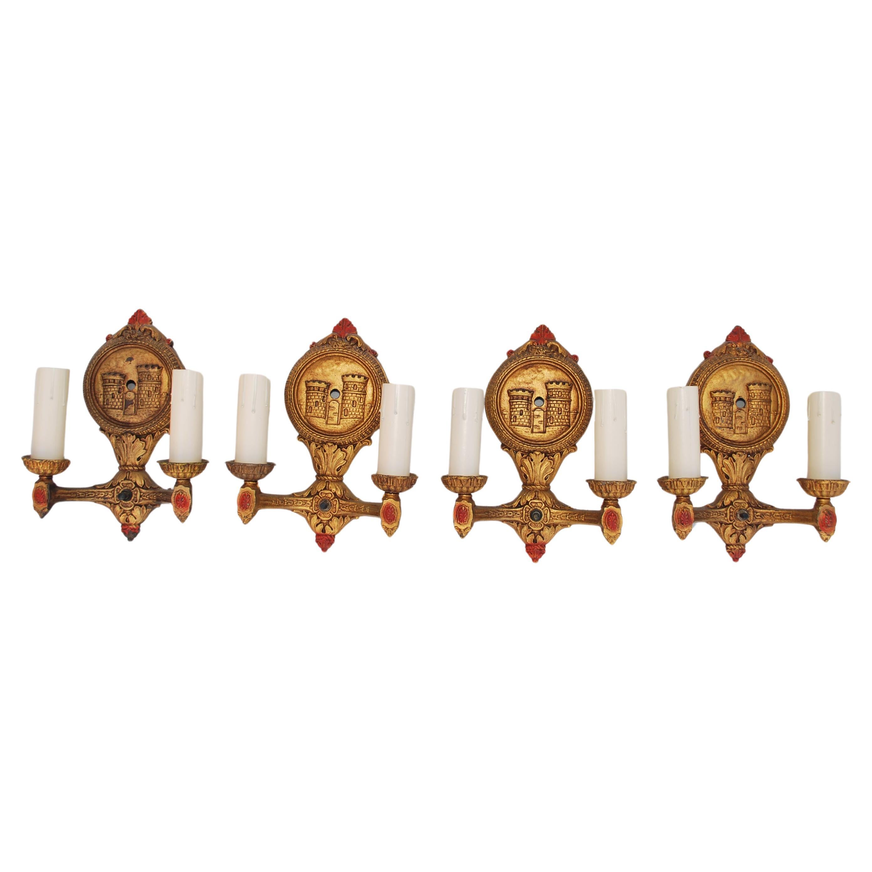 Set of four 1920's cast iron sconces For Sale