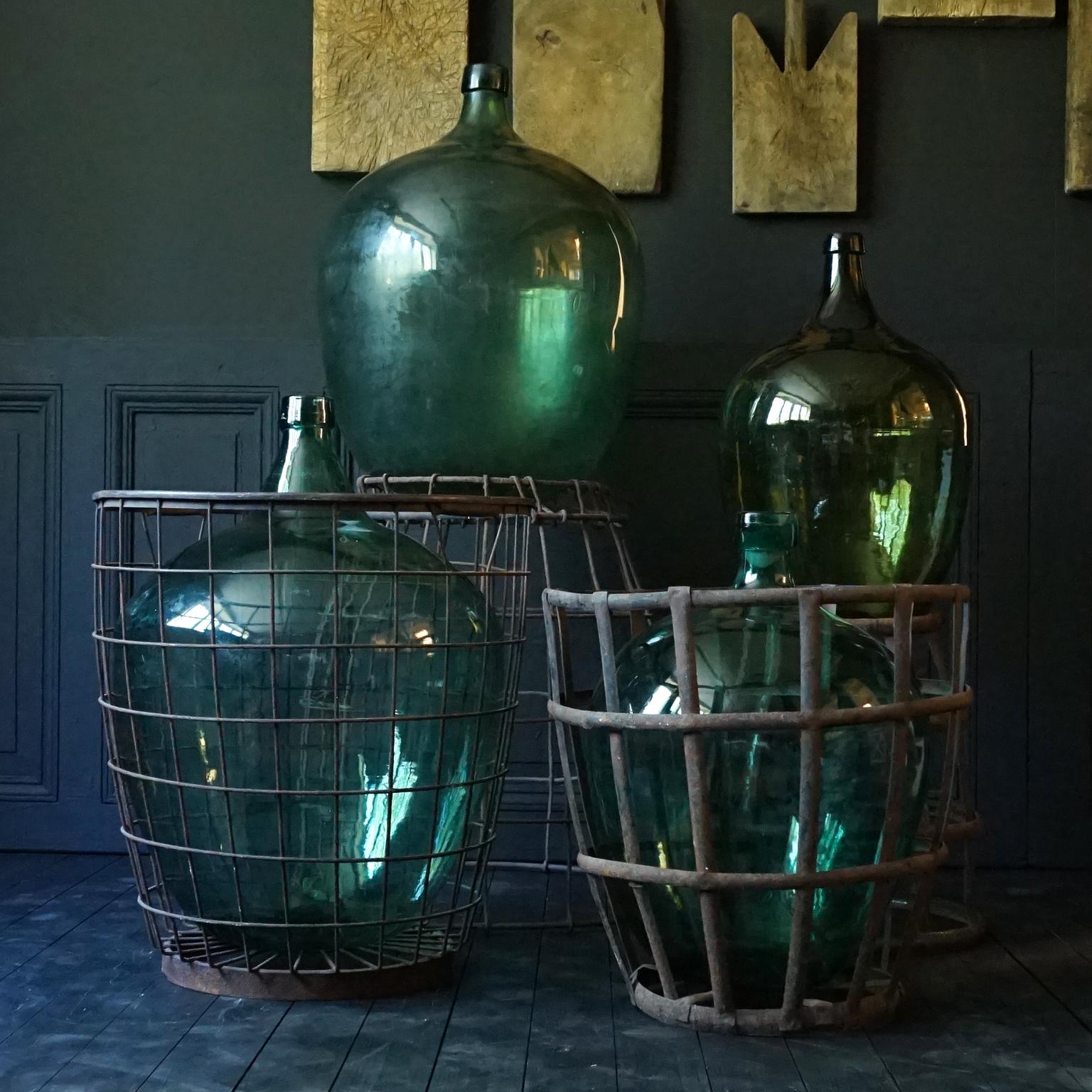 20th Century Set of Four 1920s French Green Demijohns, Lady Jeanne or Carboys in Metal Basket