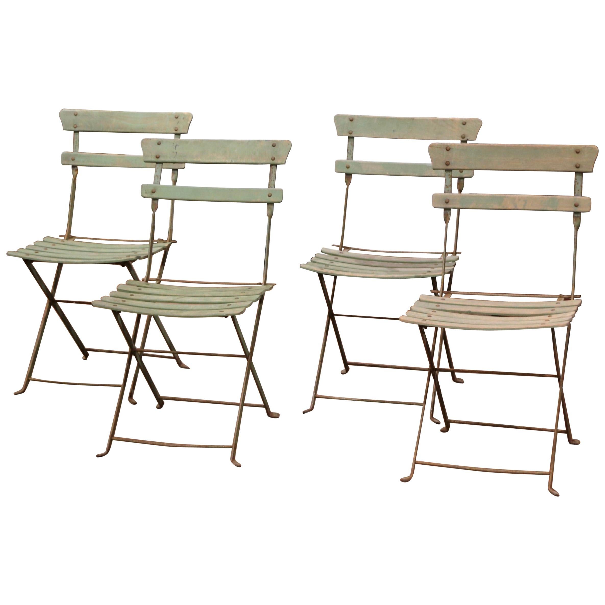 Set of Four 1920s French Iron and Wood Painted Folding Garden Chairs