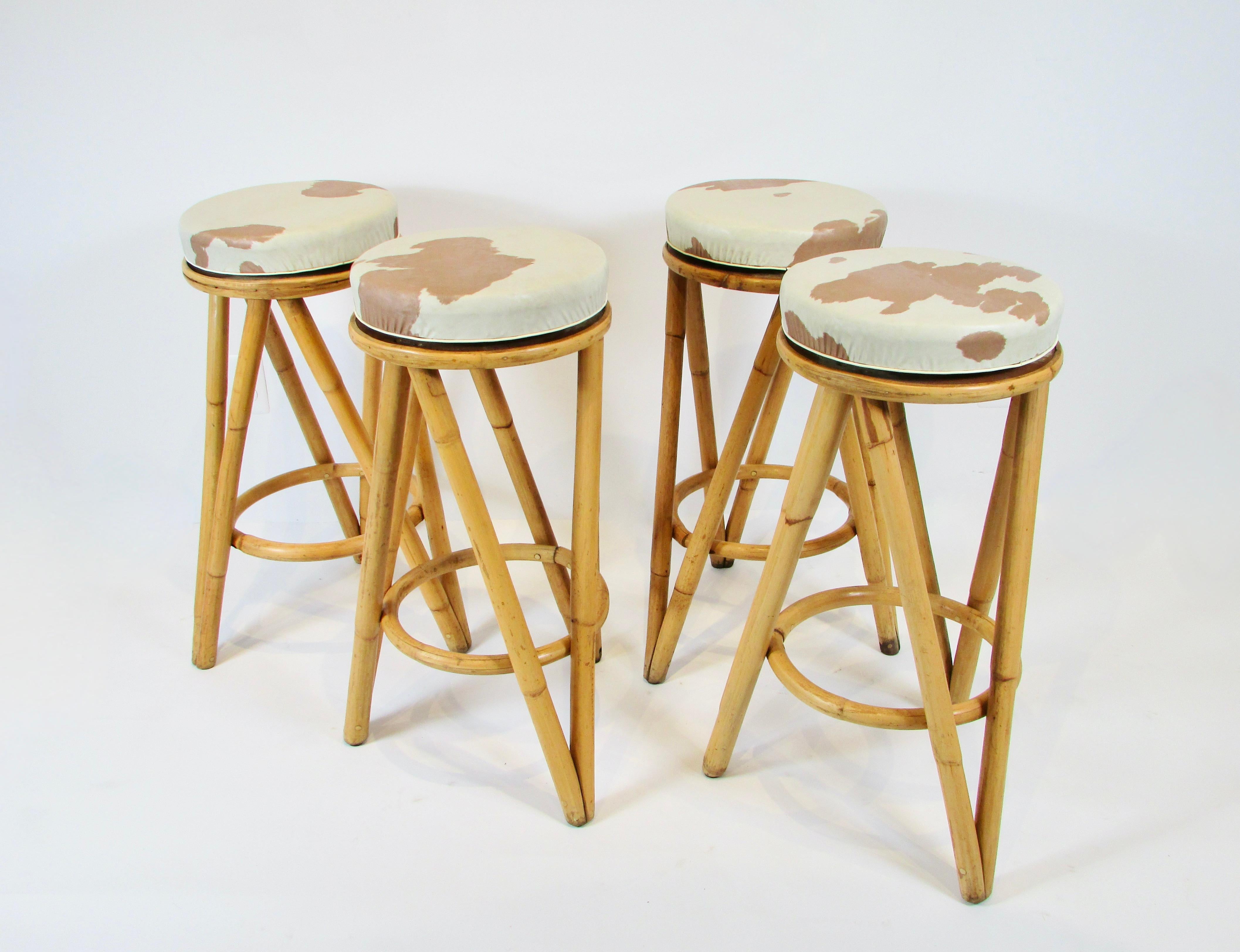 American Set of four 1950s bamboo tiki bar stools with swivel tops For Sale