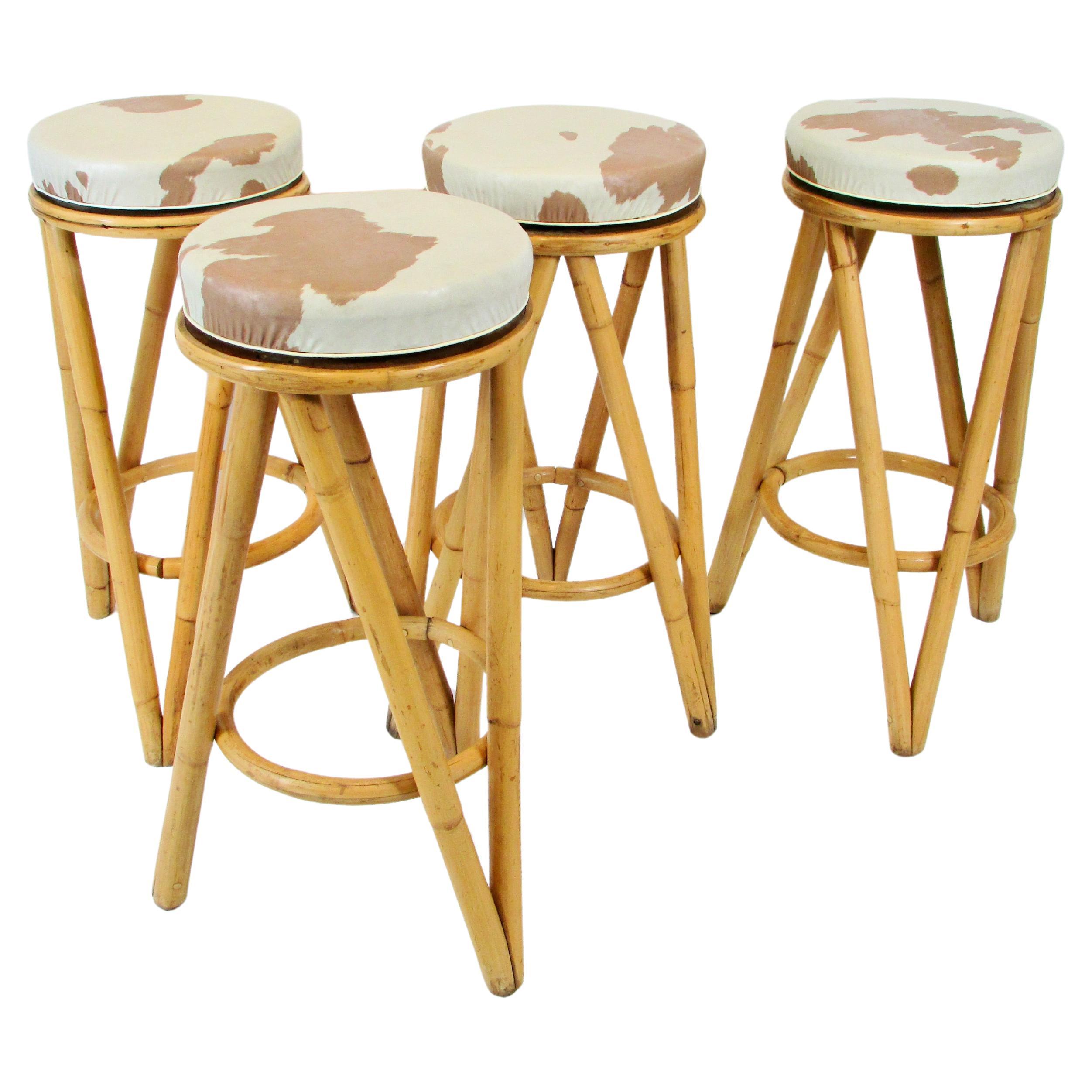 Set of four 1950s bamboo tiki bar stools with swivel tops For Sale