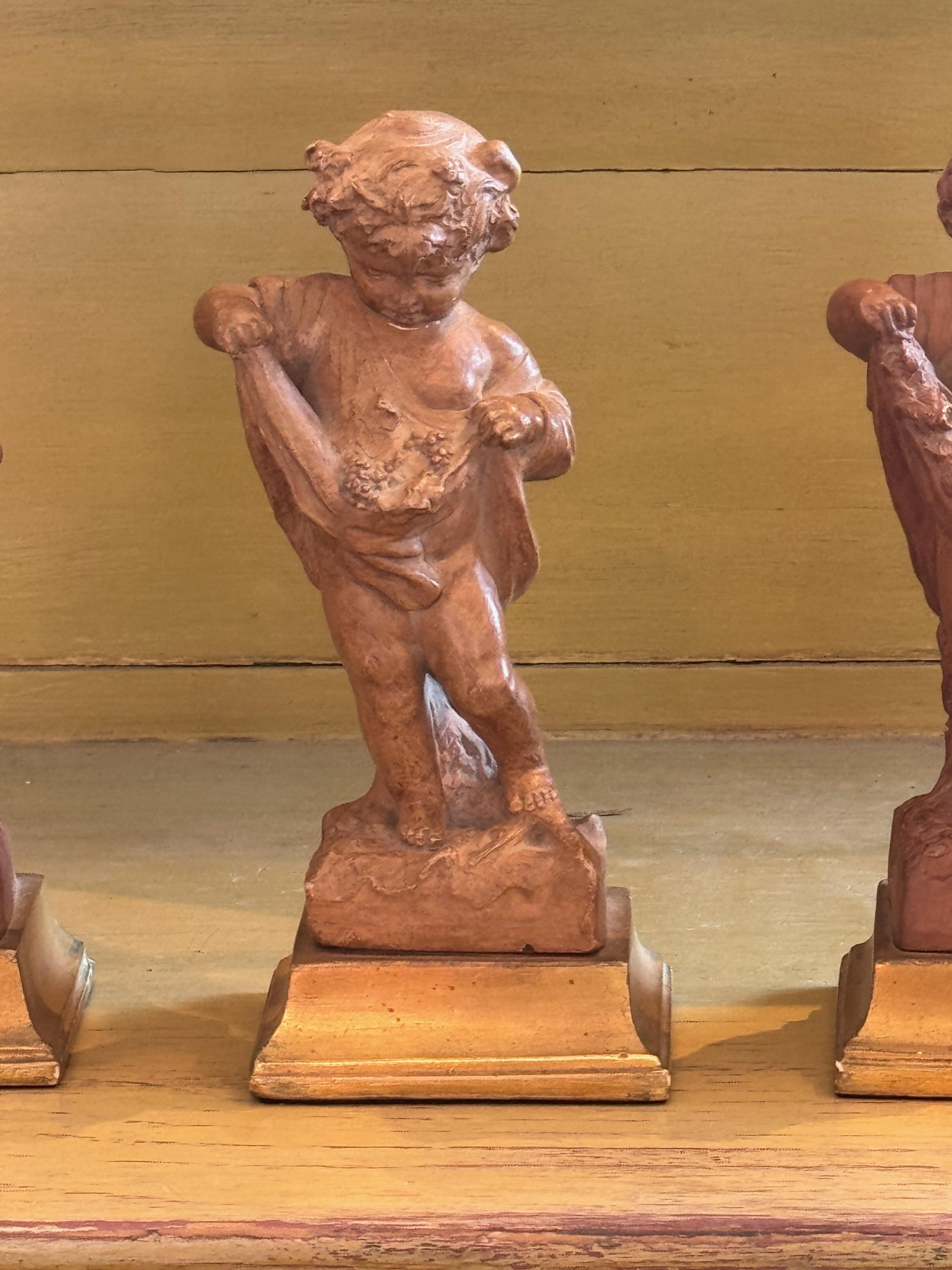 Conjunto de cuatro figuras de terracota Borghese 