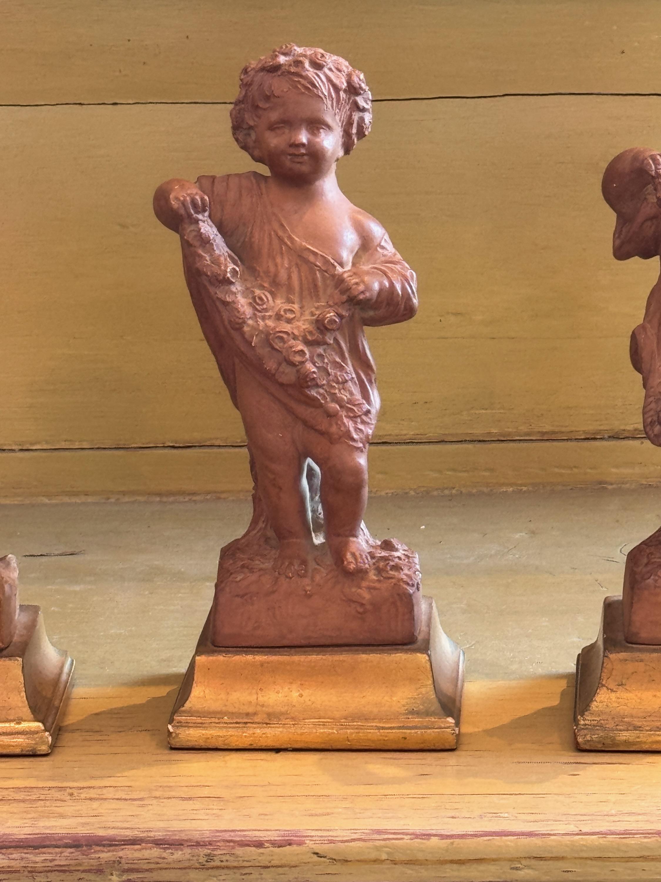 Conjunto de cuatro figuras de terracota Borghese 
