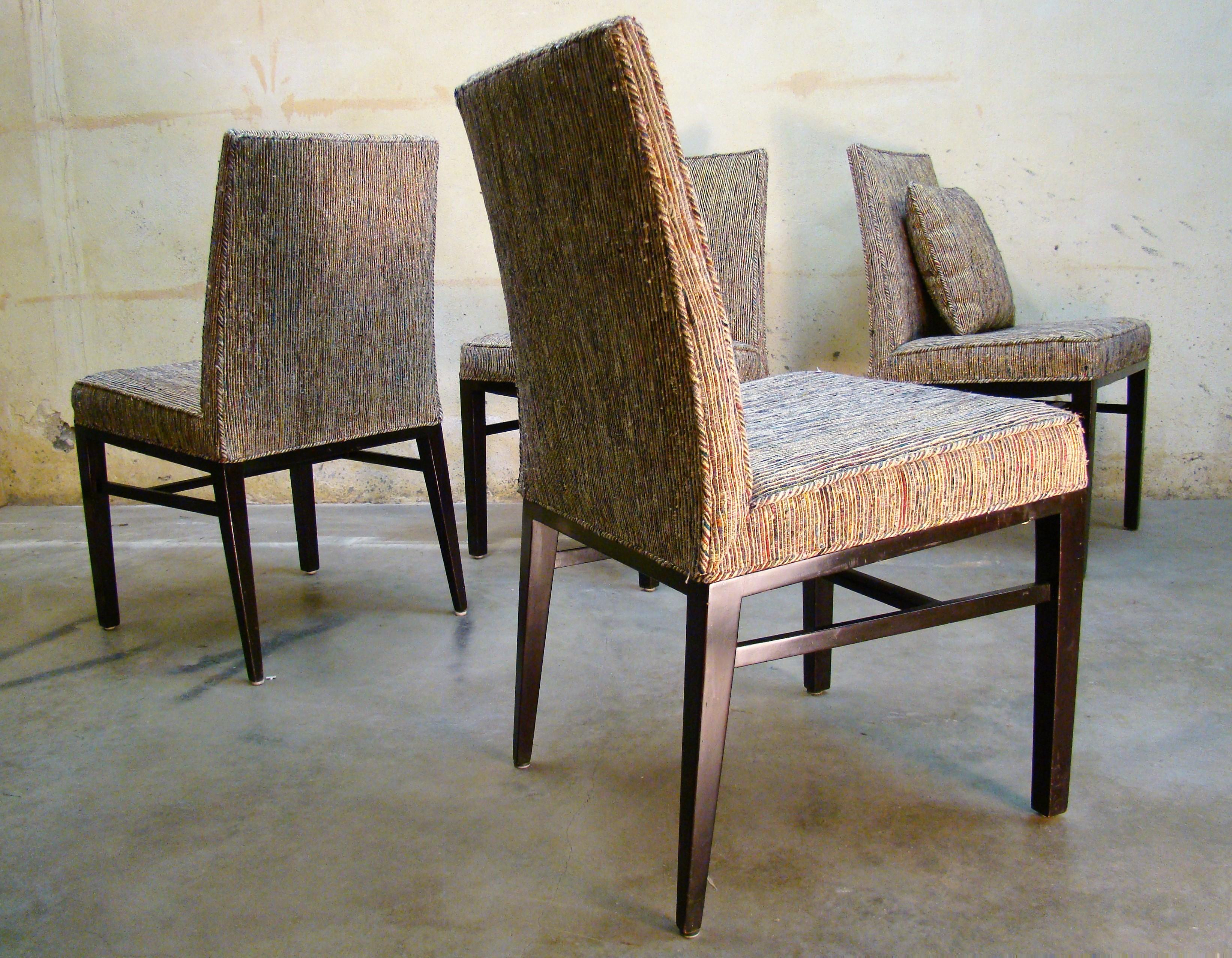 Beautiful set of four (mid-rise) Parsons dining chairs by Edward Wormley for Dunbar Furniture, circa 1959. Amazing original fabric and upholstery in usable condition with the welting worn slightly on two top corners. Heavy vertical pinstriped,