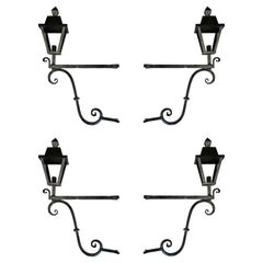 Set of Four 1950s Spanish Wrought Iron Wall Lamp Lanterns