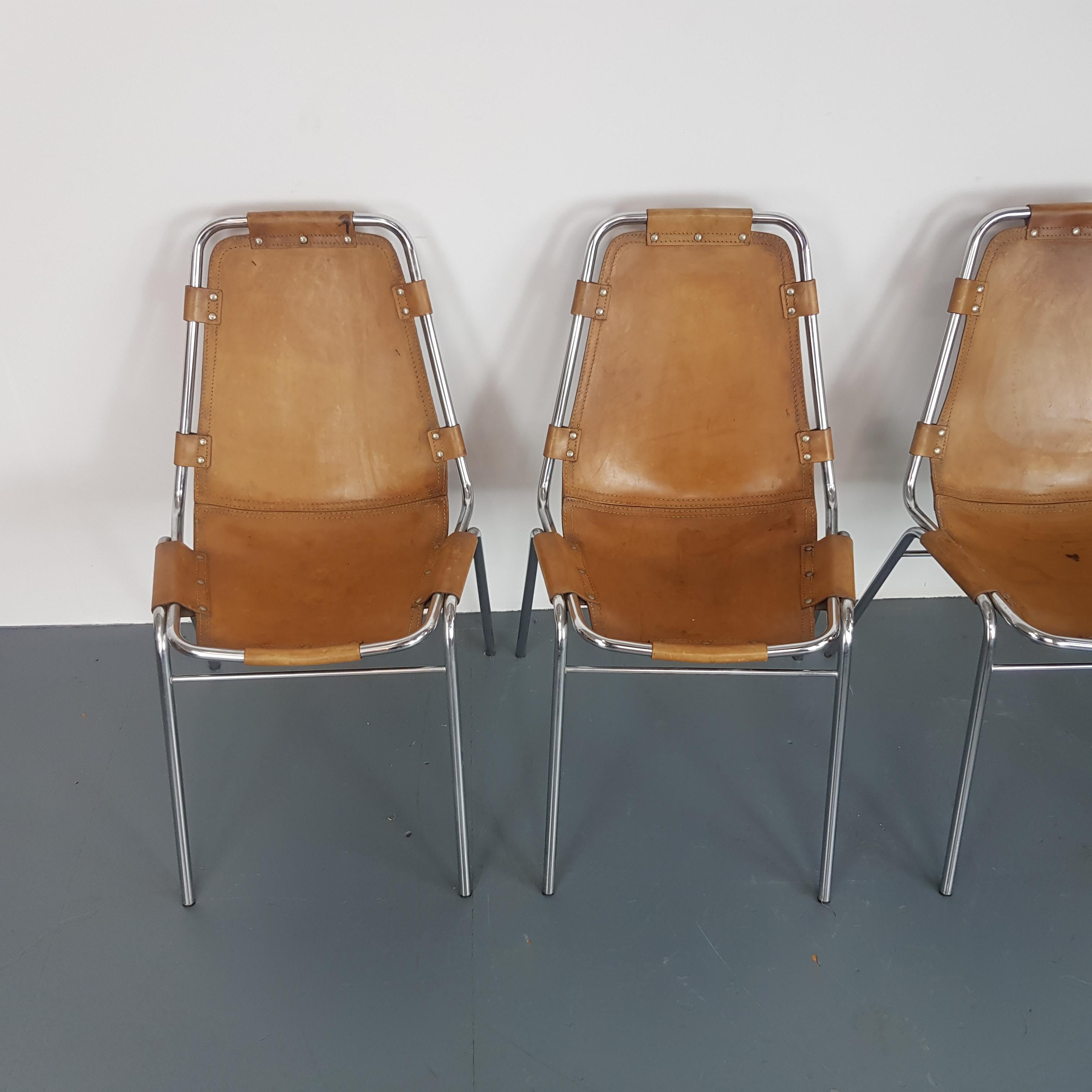 Gorgeous 1970s set of 4 Les Arcs chair date stamped 1972.

French architect and designer, Charlotte Perriand, 