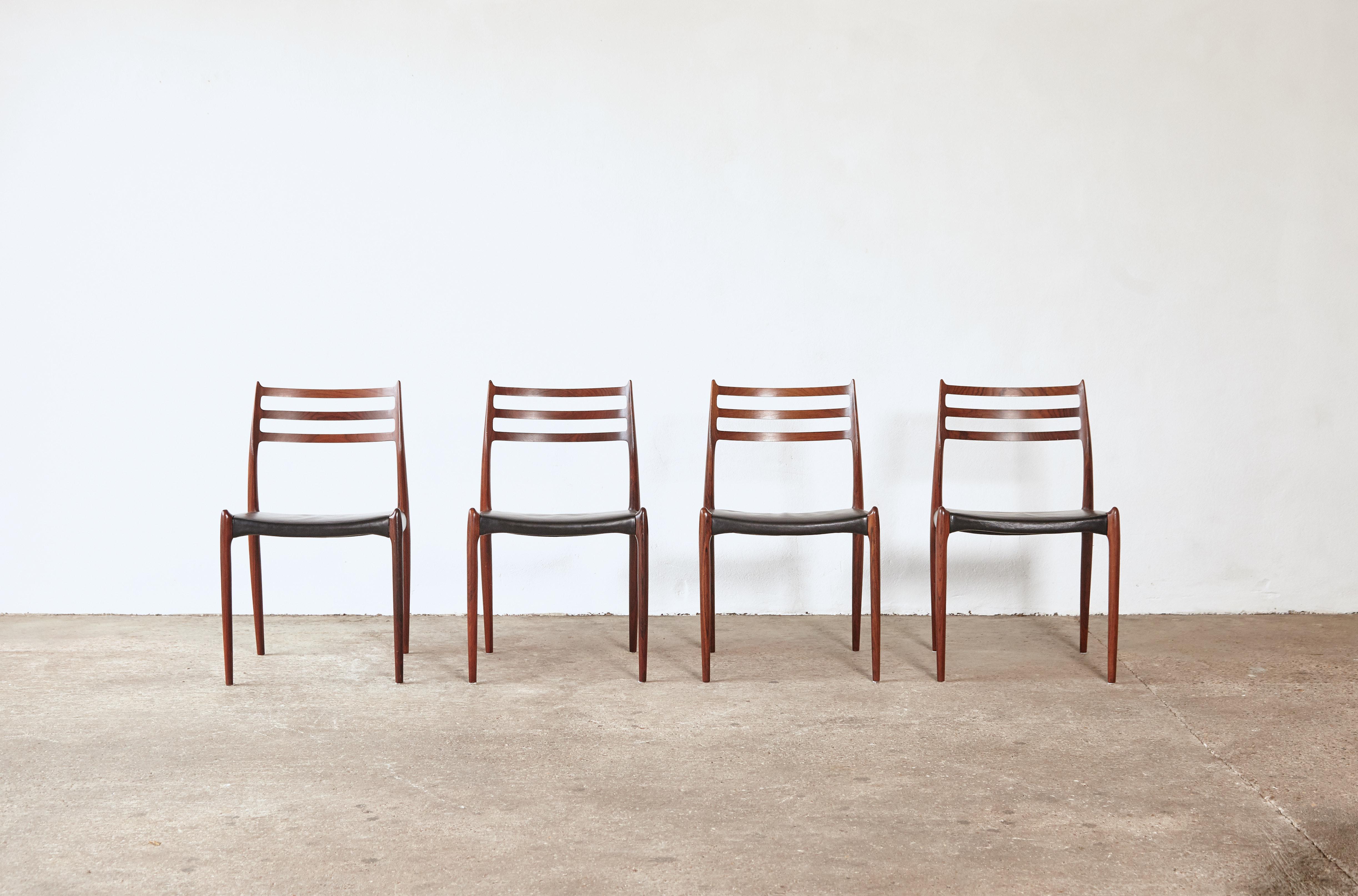 A set of four rosewood N.O. Møller 78 side chairs, in very good original condition, designed in 1962 for J.L. Møllers Møbelfabrik, Denmark.   Ships worldwide.

 
