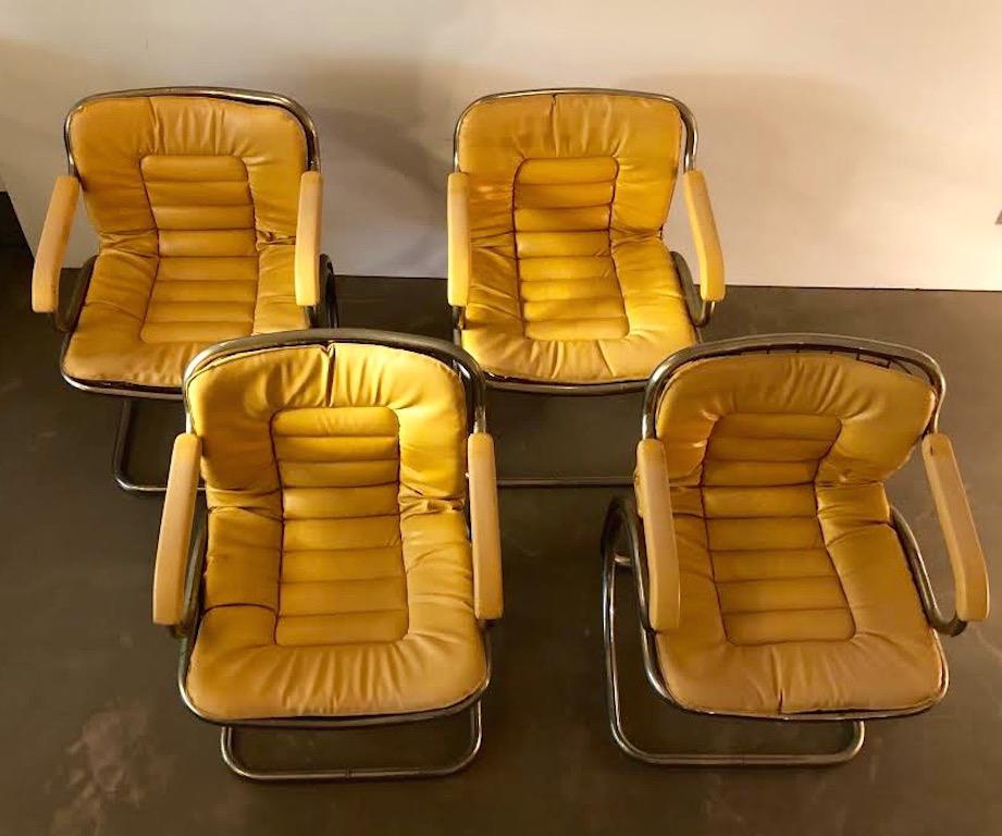 1970s Italian Gastone Rinaldi Cantilever tubular chrome armchairs with upholstered arm pads, some pitting to chrome. Search terms: Jerry Johnson style chairs, vintage 1970s chrome chairs, Tubular chrome armchairs, vintage chrome armchairs, desk